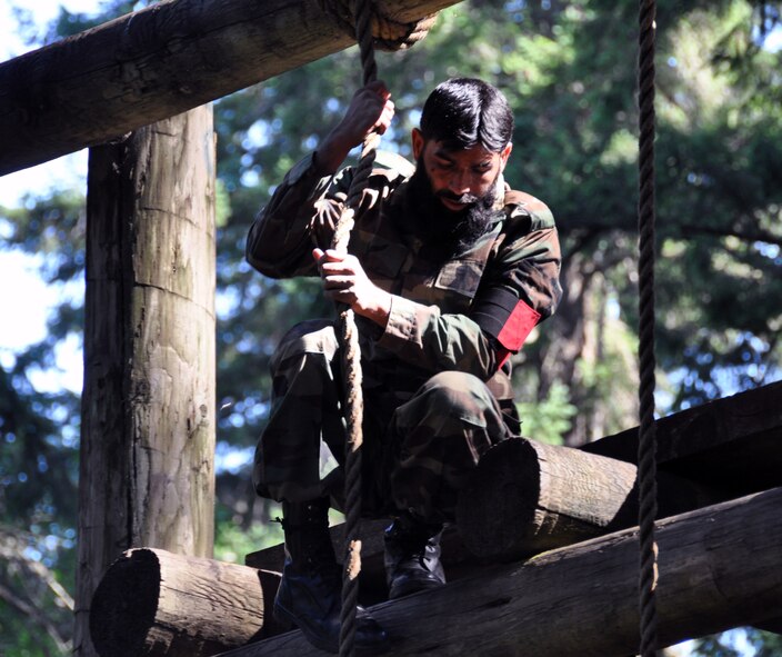 A member of the Pakistan air force, participates in the rope challenge during the Security Forces combat endurance course at the Air Mobility Rodeo 2011 July 28, 2011 at Joint Base Lewis-McChord, Wash. (U.S. Air Force photo/Airman 1st Class Michael Battles)