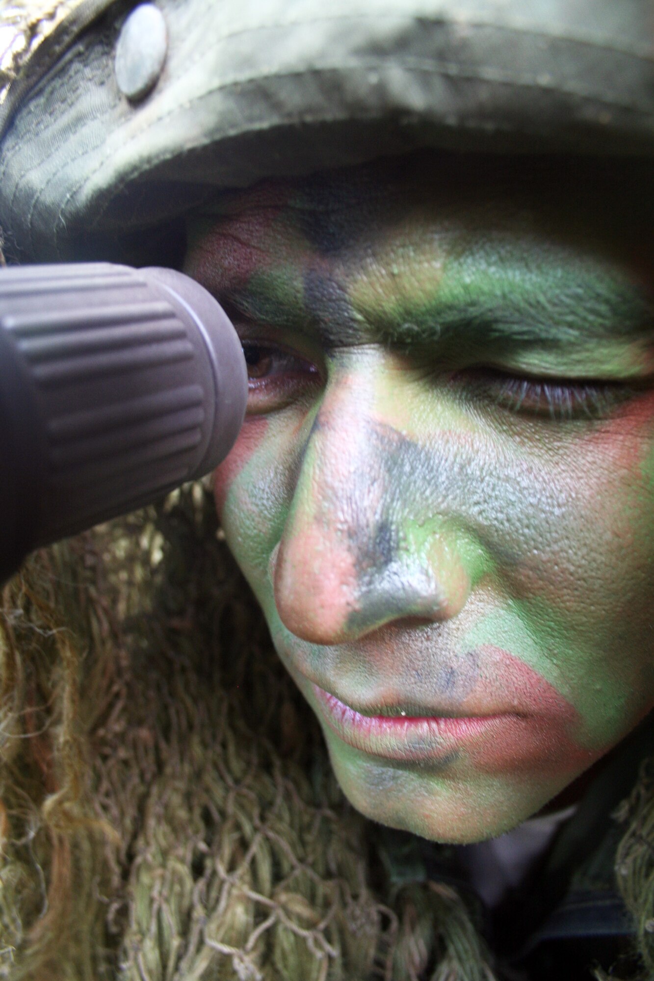 Staff Sgt. George Reinas, a sniper-qualified Airman in the Air Force, practices a scenario on a range on Joint Base Lewis-McChord, Wash., on July 27, 2011. Reinas was one of the event coordinators for the advanced marksmanship event for Air Mobility Rodeo 2011 at Joint Base Lewis-McChord. Reinas is a security forces combat skill instructor in the U.S. Air Force Expeditionary Center's 421st Combat Training Squadron at Joint Base McGuire-Dix-Lakehurst, N.J. (U.S. Air Force Photo/Master Sgt. Scott T. Sturkol)