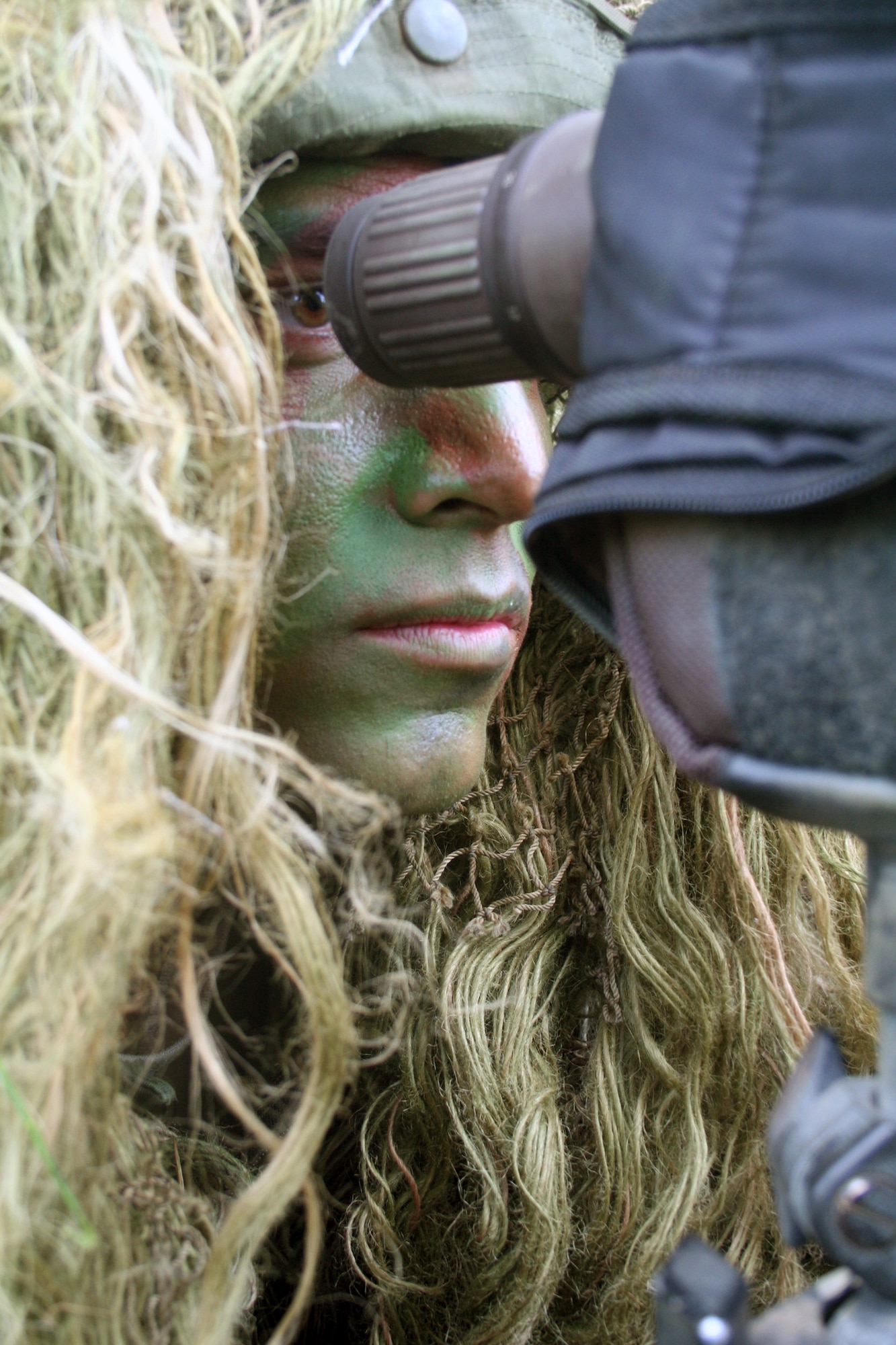 Staff Sgt. George Reinas, a sniper-qualified Airman in the Air Force, practices a scenario on a range on Joint Base Lewis-McChord, Wash., on July 27, 2011. Reinas was one of the event coordinators for the advanced marksmanship event for Air Mobility Rodeo 2011 at Joint Base Lewis-McChord. Reinas is a security forces combat skill instructor in the U.S. Air Force Expeditionary Center's 421st Combat Training Squadron at Joint Base McGuire-Dix-Lakehurst, N.J. (U.S. Air Force Photo/Master Sgt. Scott T. Sturkol)