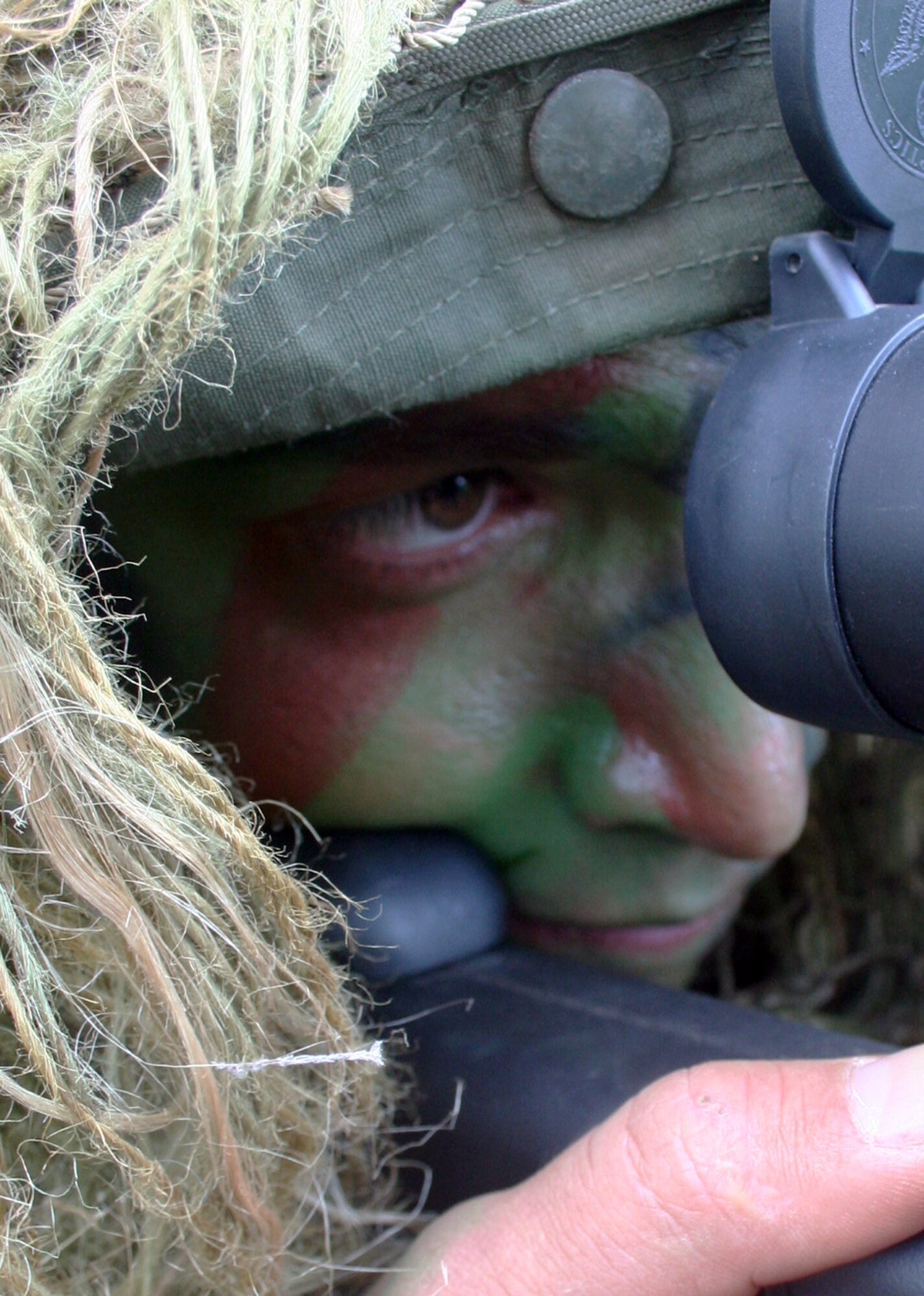 Staff Sgt. George Reinas, a sniper-qualified Airman in the Air Force, practices a scenario on a range on Joint Base Lewis-McChord, Wash., on July 27, 2011. Reinas was one of the event coordinators for the advanced marksmanship event for Air Mobility Rodeo 2011 at Joint Base Lewis-McChord. Reinas is a security forces combat skill instructor in the U.S. Air Force Expeditionary Center's 421st Combat Training Squadron at Joint Base McGuire-Dix-Lakehurst, N.J. (U.S. Air Force Photo/Master Sgt. Scott T. Sturkol)