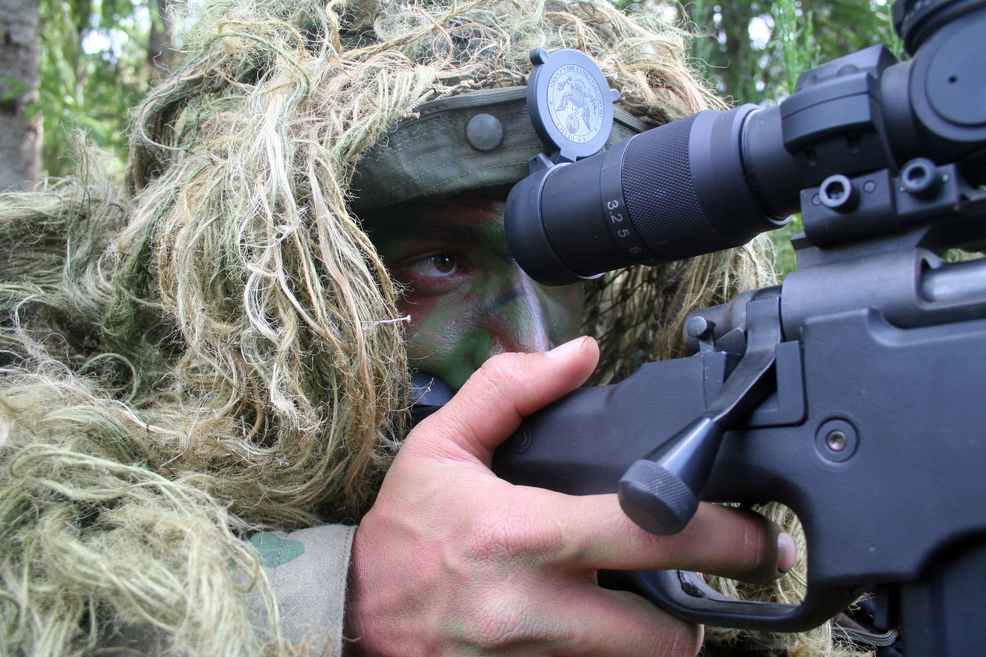 Staff Sgt. George Reinas, a sniper-qualified Airman in the Air Force, practices a scenario on a range on Joint Base Lewis-McChord, Wash., on July 27, 2011. Reinas was one of the event coordinators for the advanced marksmanship event for Air Mobility Rodeo 2011 at Joint Base Lewis-McChord. Reinas is a security forces combat skill instructor in the U.S. Air Force Expeditionary Center's 421st Combat Training Squadron at Joint Base McGuire-Dix-Lakehurst, N.J. (U.S. Air Force Photo/Master Sgt. Scott T. Sturkol)