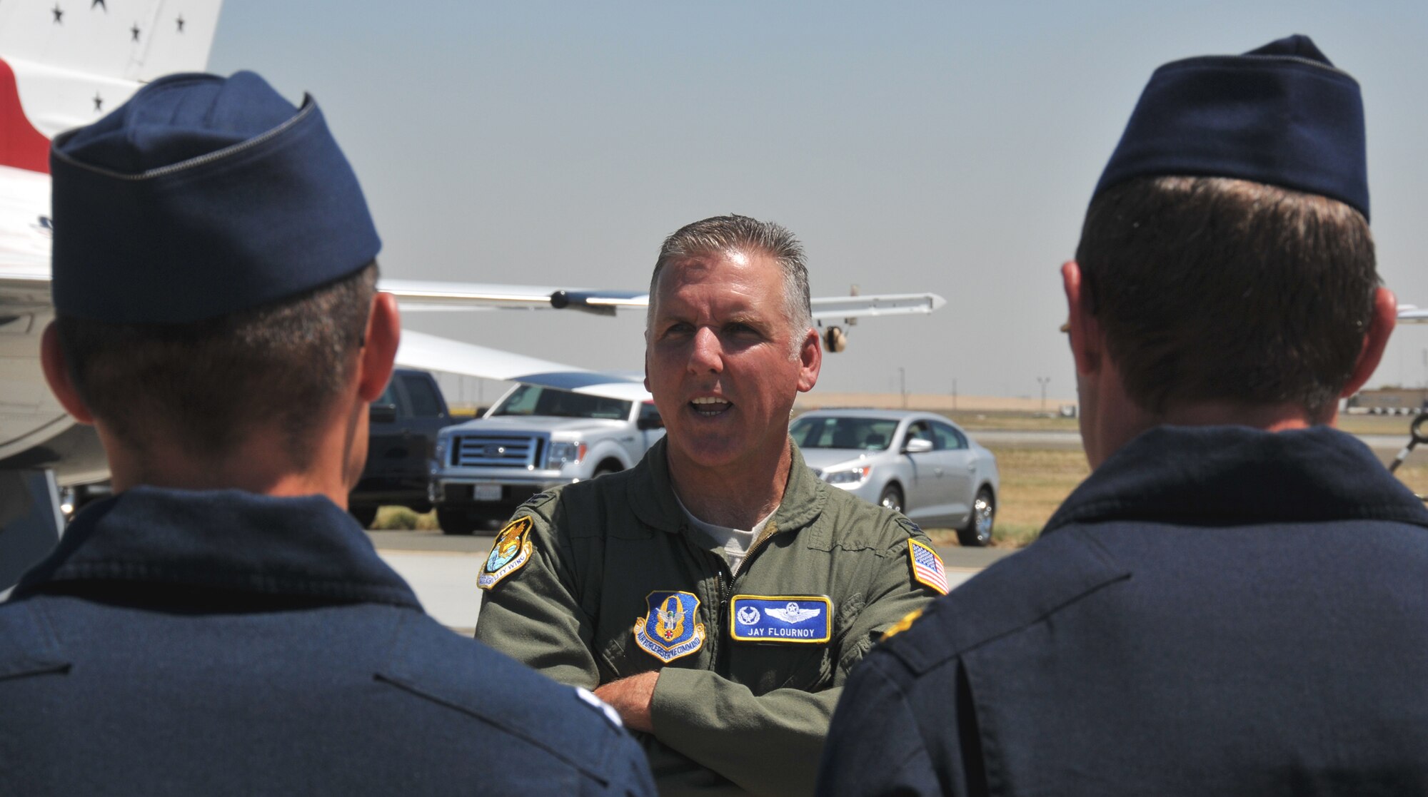 TRAVIS AIR FORCE BASE, Calif. -- Col. Jay Flournoy, commander of the 349th Air Mobility Wing, welcomes pilots of The Thunderbirds upon their arrival here at Travis. The Air Force precision flying team was the air shows main event held  at the base on  the 30th and 31st of July. (U.S. Air Force photo/Master Sgt. Robert Wade)