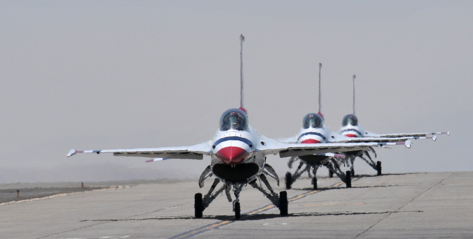 TRAVIS AIR FORCE BASE, Calif. --The Thunderbirds taxi in formation upon their arrival in preparation for the air show scheduled here at Travis. The Air Force precision flying team was the air shows main event held  at the base on  the 30th and 31st of July. (U.S. Air Force photo/Master Sgt. Robert Wade)