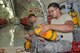Crew chief Staff Sgt. Antonio Santiago (right) and dedicated crew chief Staff Sgt. Jonathan Flynn fit new harnesses around a repainted oxygen bottle inside a refurbished KC-135 Stratotanker at March Air Reserve Base, Calif., July 19, 2011. The complete interior refurbishment of the 49-year-old aircraft was the first of 13 upcoming KC-135 refurbishments for the 452nd Maintenance Group. (U.S. Air Force photo/Megan Just)