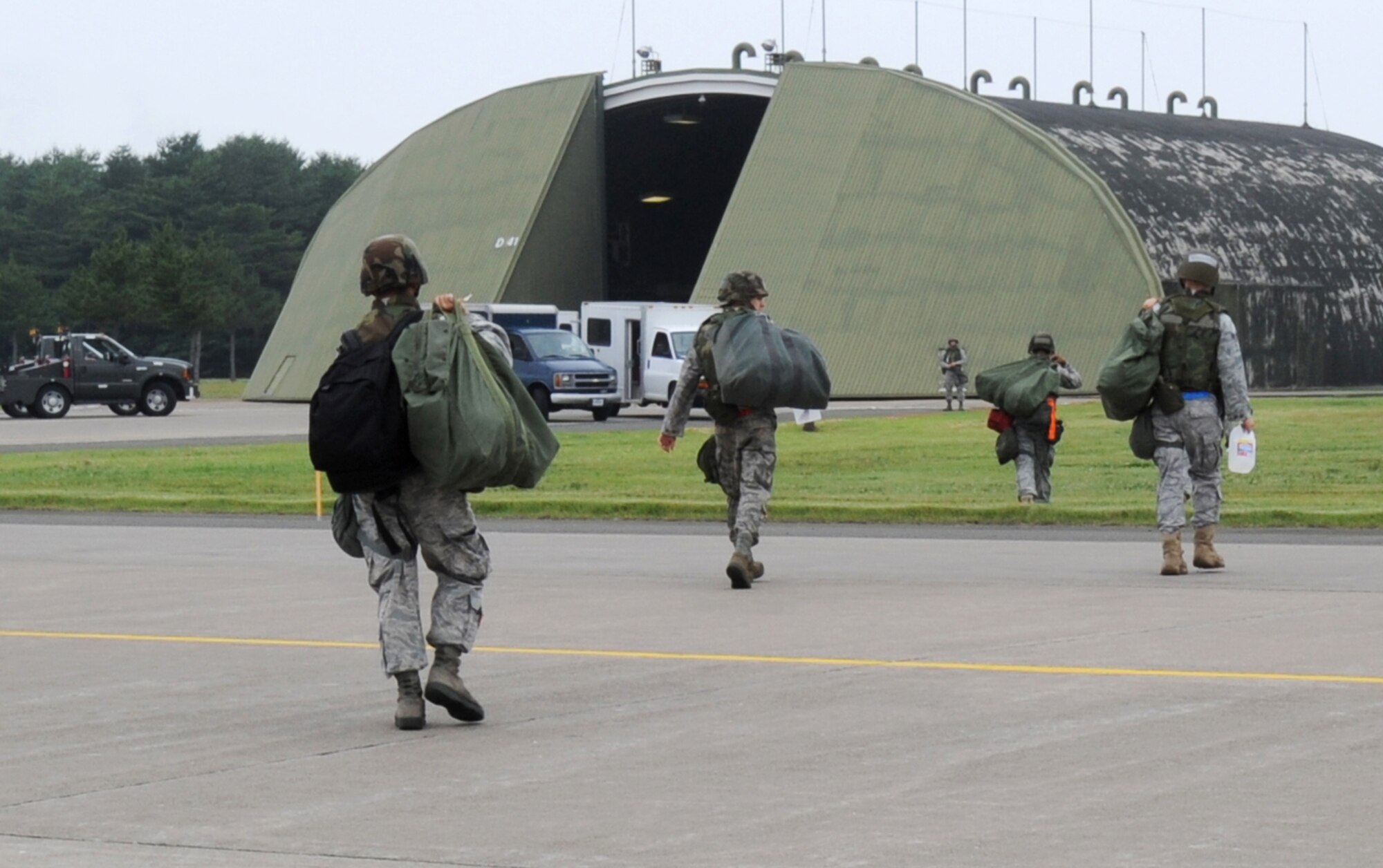 MISAWA AIR BASE, Japan -- Members of the 35th Aircraft Maintenance Squadron, arrive at a simulated deployed location, during a pre-deployment training exercise July 28.  The 35th Fighter Wing is engaged in a three-day exercise, simulating a variety of scenarios in a pre-combat environment.     (U.S. Air Force photo/Staff Sgt. April Quintanilla)