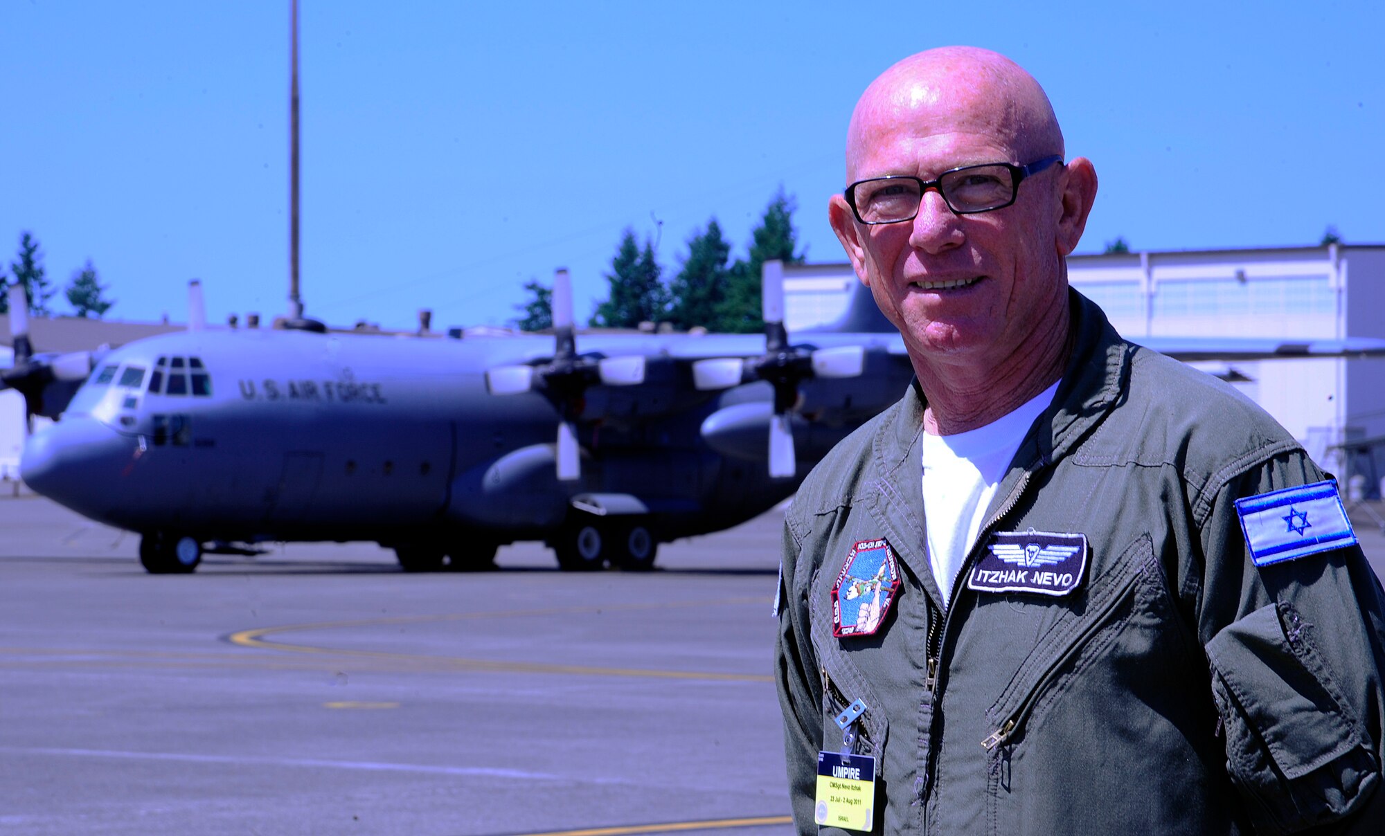 Chief Master Sgt. Itzhak Nevo stands in front of a C-130 Hercules at Joint Base Lewis-McChord, Wash., on July 28, 2011. The chief is the sole representative from Israel at the Air Mobility Rodeo 2011 competition, where he is serving as an umpire. Nevo has been a C-130 maintainer since 1975, longer than many of the people at Rodeo have been alive, but his vast experience with the airframe is exactly why he made the perfect judge, according to his peers. (U.S. Air Force photo/Staff Sgt. J.G. Buzanowski)