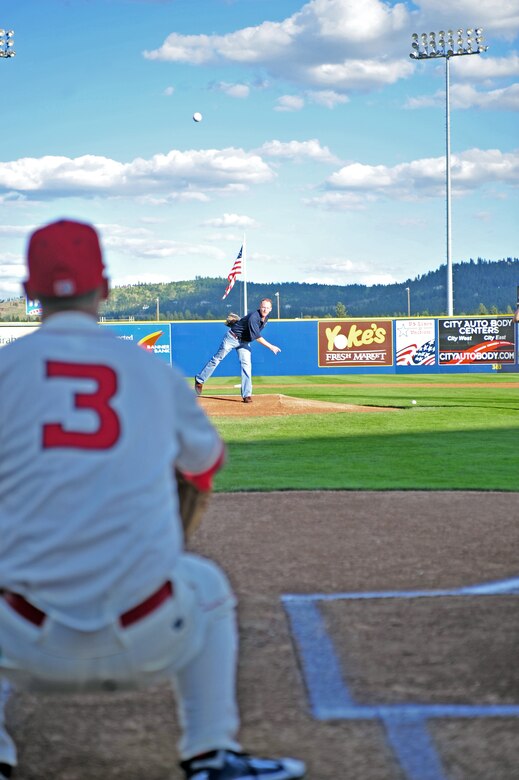 Col. Marc C. Van Wert, 92 Air Refueling Wing vice commander, throws the first pitch at a Spokane Indians baseball game at the Avista Stadium, Spokane, Wash.,  July 22, 2011. The Spokane Indians are the class A short-season affiliate of the Texas Rangers. (U.S. Air Force photo/ Airman 1st Class Taylor Curry)