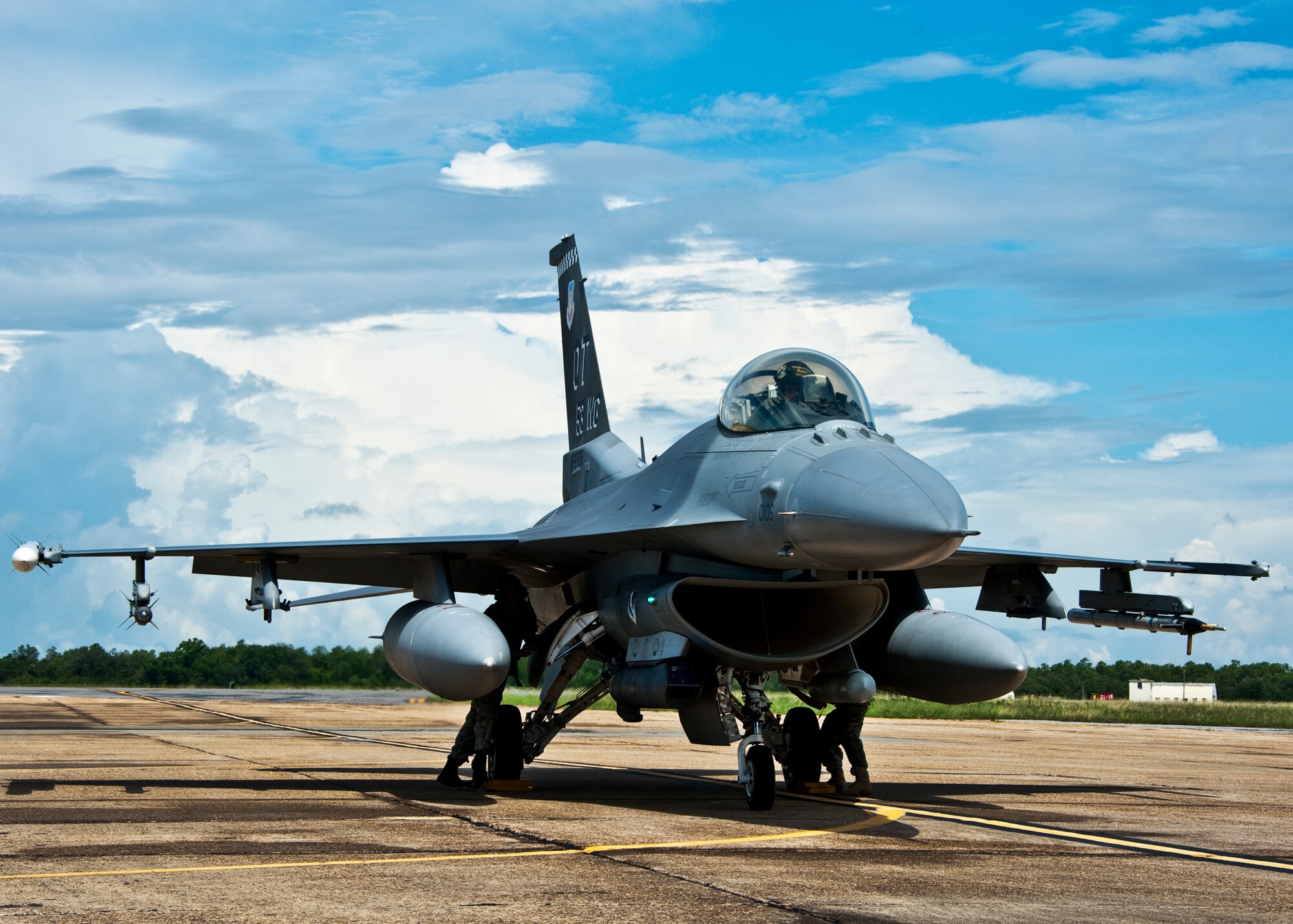 46th Maintenance Group Airmen recover an F-16 Fighting Falcon upon its return to Eglin Air Force Base, Fla., from a sortie July 22.  The 46th Maintenance Group maintains A-10s, F-16s, F-15s, and other aircraft for both the 46th TW and 53rd Wing.  (U.S. Air Force photo/Samuel King Jr.)