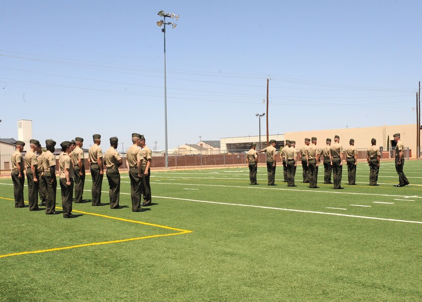 DYESS AIR FORCE BASE, Texas -- Marine corporals attending the Corporals Course get inspected July 27, 2011. The Marine’s Enlisted Professional Military Education course is a 16-day course held once a year at Dyess. The course teaches Marine noncommissioned officers (corporals) how to lead in today’s Marine Corps. (U.S. Air Force photo by Airman 1st Class Jenifer H. Calhoun/Released)