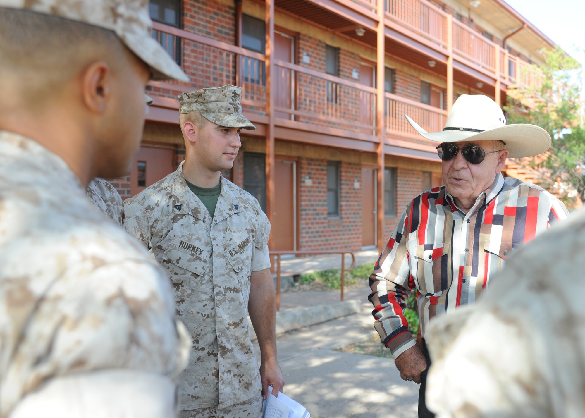 DYESS AIR FORCE BASE, Texas -- Retired Sgt. Maj. Troy Hensley, right, speaks to Marine corporals attending the Corporals Course July 27, 2011. The Marine’s Enlisted Professional Military Education course is a 16-day course held once a year at Dyess. The course teaches Marine noncommissioned officers (corporals) how to lead in today’s Marine Corps. (U.S. Air Force photo by Airman 1st Class Jenifer H. Calhoun/Released)
