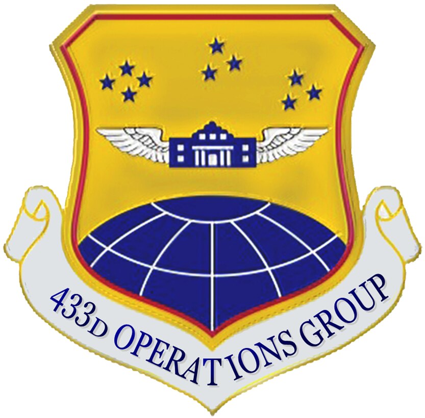 433rd Operations Group shield with textured effect and in full color. (U.S. Air Force graphic/Senior Airman Luis Loza Gutierrez)