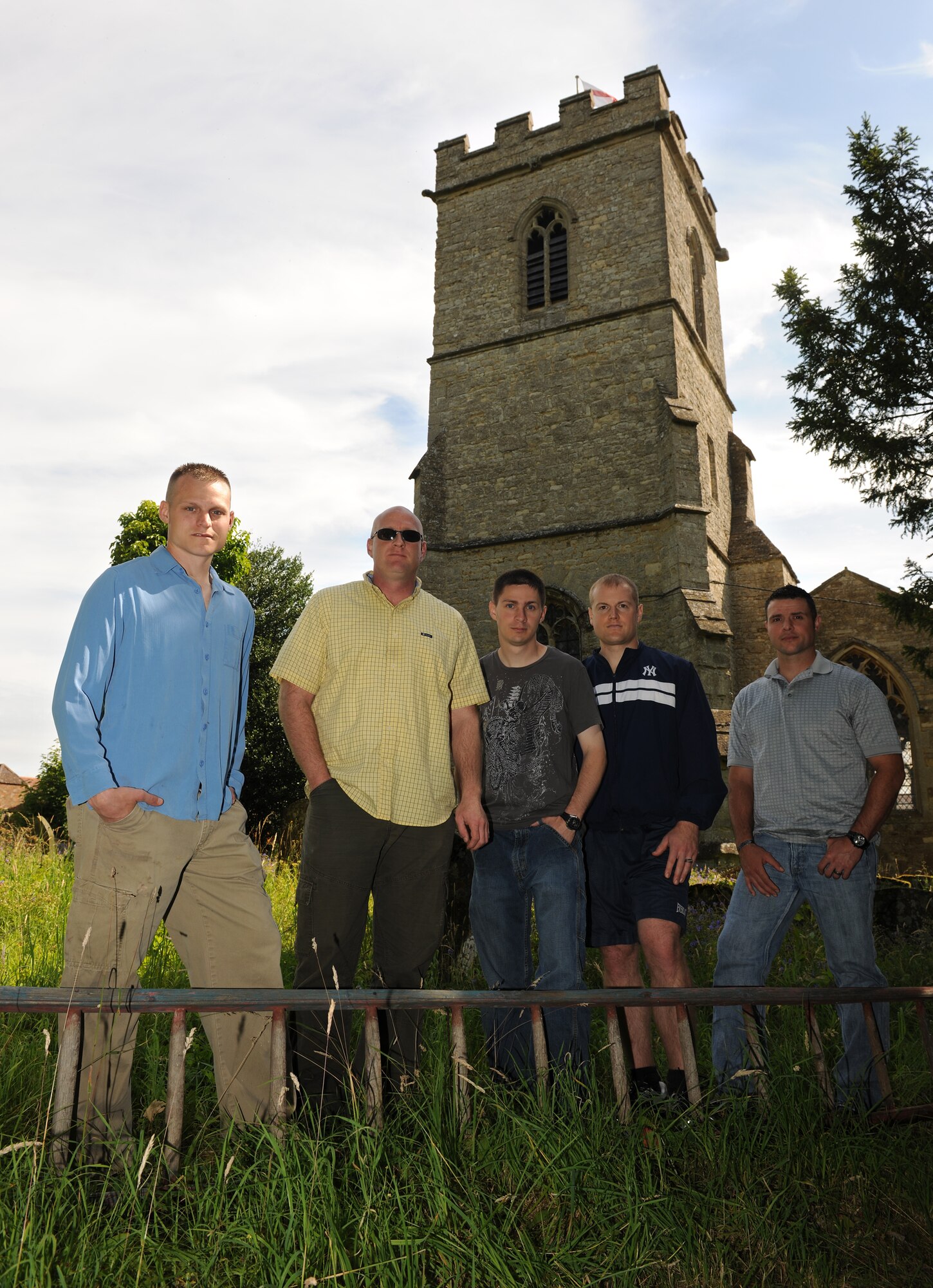 TINGEWICK, United Kingdom - (From left to right) Staff Sgt. Arthur Scruggs, Tech. Sgt. Edward Nelson, Staff Sgt. David Vantreese, Staff Sgt. Samuel Fullerton and Staff Sgt. Mark Sullivan all helped with a labor-intensive task of repairing items in the town's 12th century church here. All Airmen are assigned to the 422nd Security Forces Squadron at RAF Croughton. (U.S. Air Force photo by Tech. Sgt. John Barton)