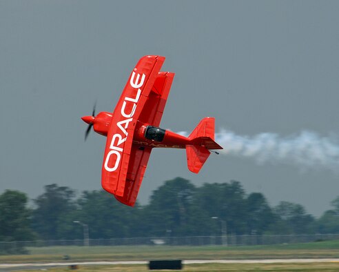 The Oracle stunt plane, piloted by Sean D. Tucker, thrilled the crowd with its daredevil routine. Tucker was inducted into the National Aviation Hall of Fame in 2008. (USAF photo by Ben Strasser)