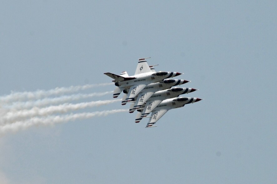 Much skill and nerve is required for USAF Thunderbird pilots to fly in such tight formation. Since their inception in May of 1953, the Thunderbirds have kept audiences entertained and amazed.  (USAF photo by Ben Strasser) 

