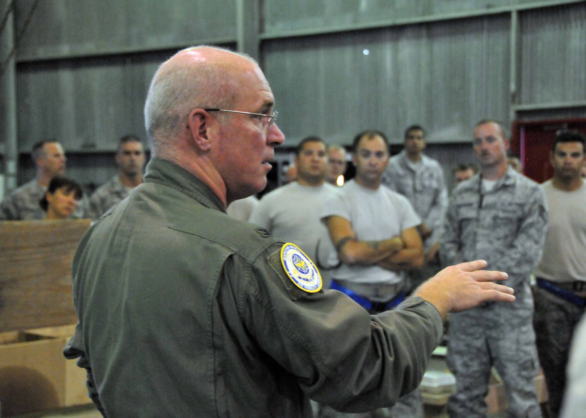 Col. John Quinn, 313th Air Expeditionary Wing vice commander, briefs aircraft maintenance personnel on the current mission status and takes questions from Airmen on July 26, 2011, at a base in Western Europe. (U.S. Air Force photo/Capt. John Capra)