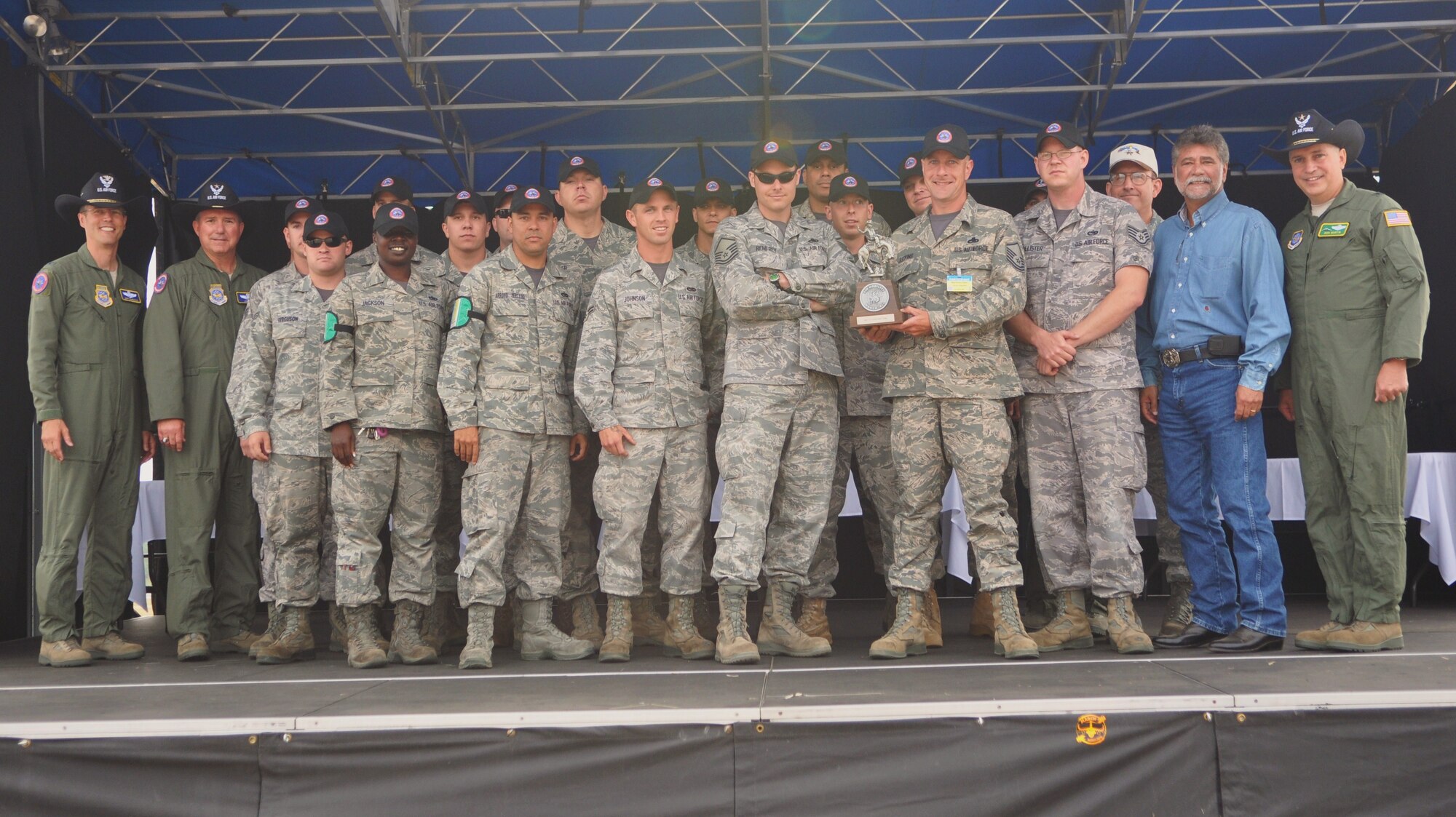 Maintenance Airmen from the 62nd Airlift Wing and 627th Air Base Group combo team for Air Mobility Rodeo 2011 won the Best C-17 Preflight trophy during an awards ceremony at Joint Base Lewis-McChord, Wash., July 29, 2011. Rodeo is a biannual readiness competition that brings Airmen from around the globe to prove and hone their skills in events such as airdrops, aerial refueling, maintenance, security forces and more. (U.S. Air Force photo/Airman 1st Class Leah Young) 