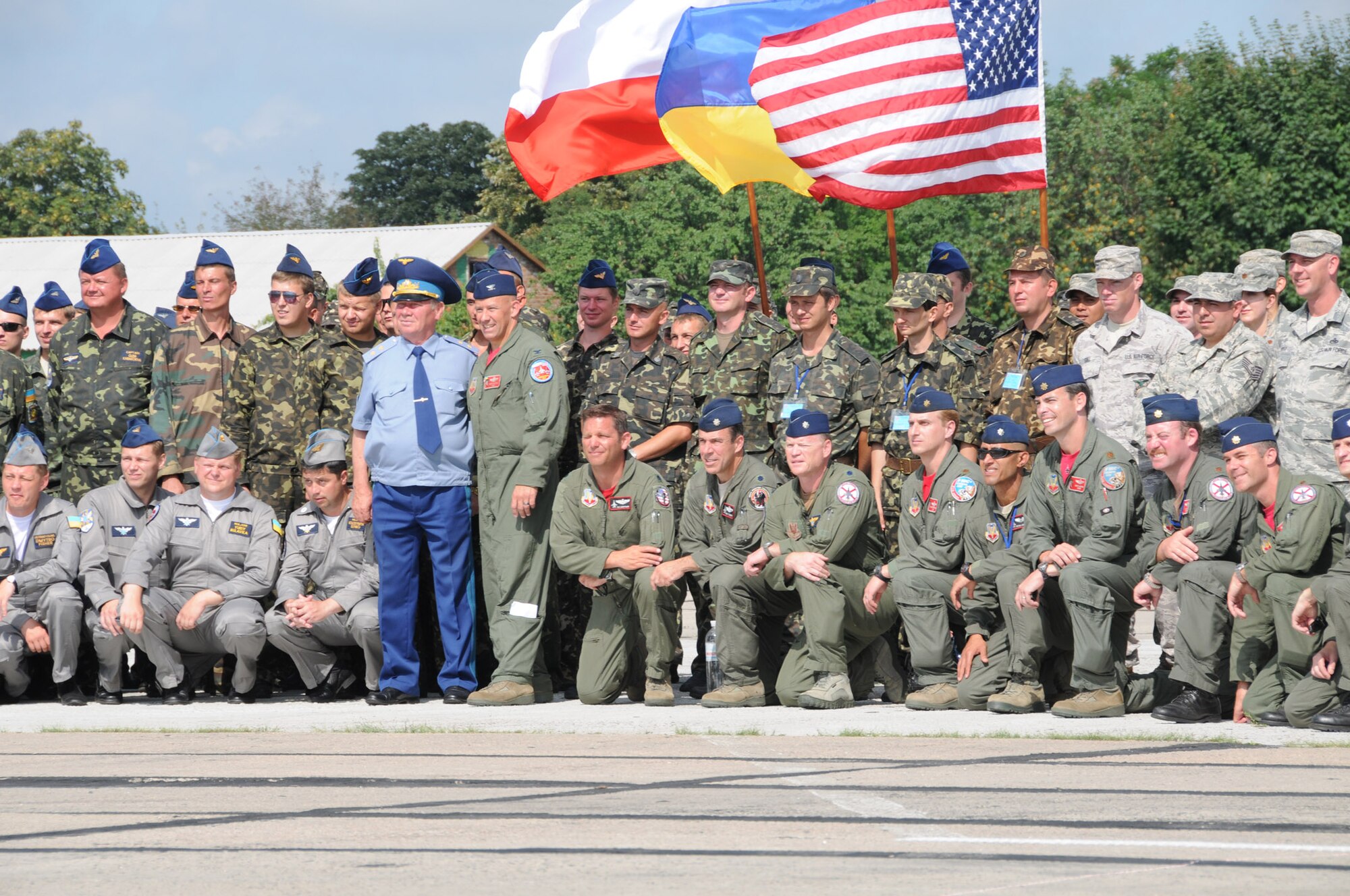 Lt. Gen. Vasyl Nikiforov, the deputy commander of the Ukrainian air force stands with Col. Scott Patten, the commander of the Alabama Air National Guard’s 187th Fighter Wing, and the joint Ukraine-U.S. Air National Guard team at the conclusion of SAFE SKIES 2011 at Mirgorod Air Base, Ukraine. SAFE SKIES is a multinational aerial event designed to provide a unique opportunity for Ukrainian, Polish and American air forces to fly together to help prepare the Polish and Ukrainians for enhanced air supremacy and air sovereignty operations.  (U.S. Air Force photo/Maj. Matthew T. Mutti)