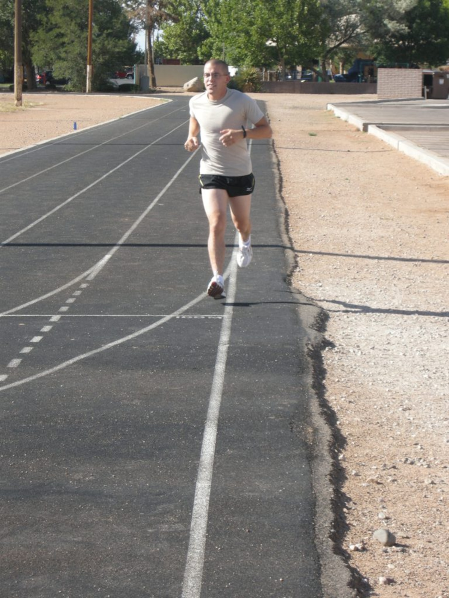 Airman 1st Class Joseph J. Medley, 58th Maintenance Operations Squadron, trains at Kirtland Air Force Base for the Air Force Marathon.

Photo by John Cochran
