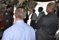 PETERSON AIR FORCE BASE, Colo. – Civic leaders from cities and towns surrounding Scott Air Force Base, Ill. listen as crew members talk about the capabilities of the C-130H aircraft. The 932nd Airlift Wing brought 28 of their community members here July 21 to learn to learn first-hand about the roles and missions of the Air Force and Air Force Reserve. This tour focused on the Air Force's Total Force Initiative and educating leaders of character. (U.S. Air Force photo/Tech. Sgt. Daniel Butterfield)