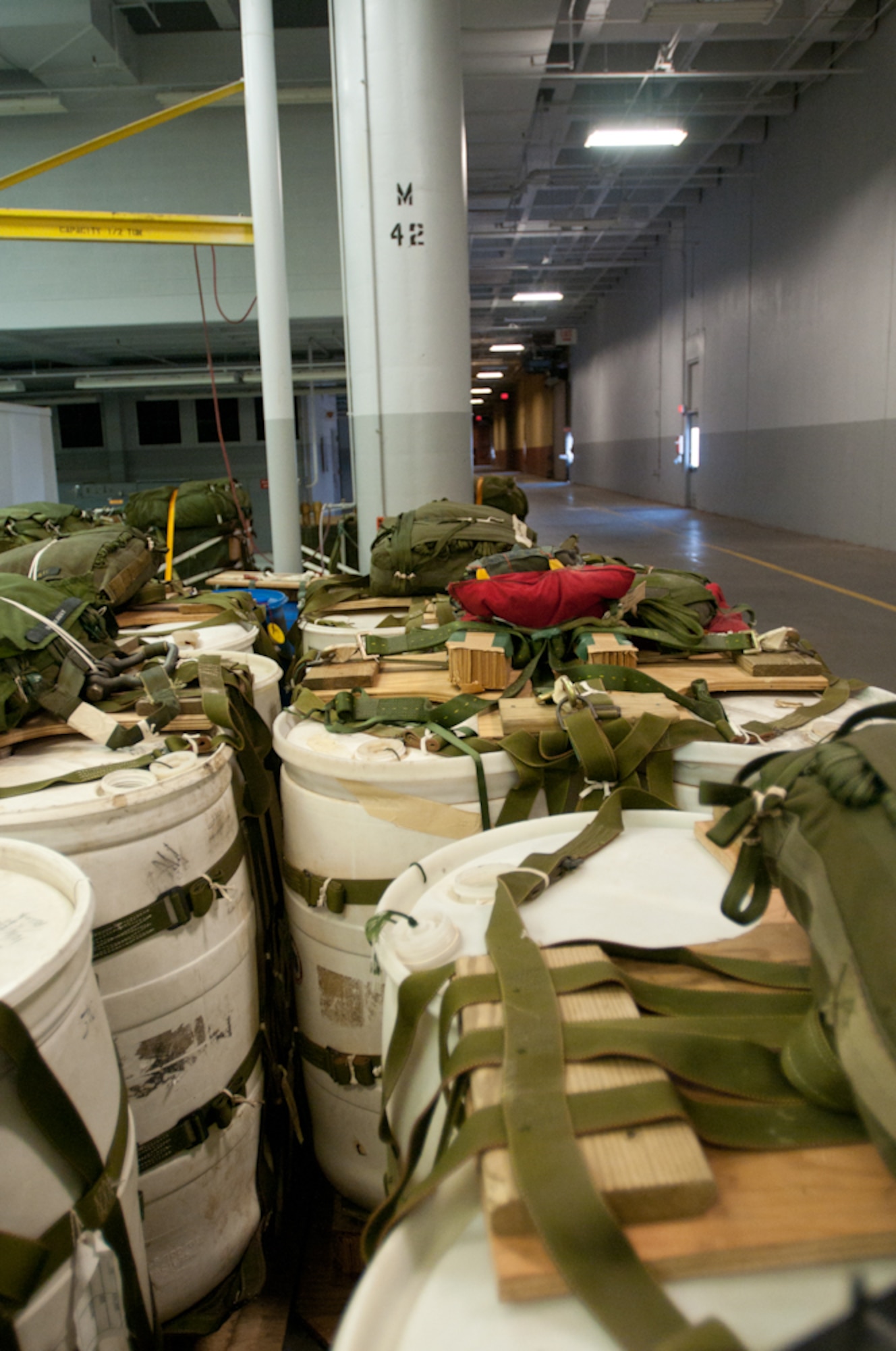 Airdrop loads are pallatized and ready for missions conducted by the 139th Airlift Wing, Missouri Air National Guard. The servicemembers are currently working out of the Kansas City International Airport in Kansas City, Mo., July 26,2011. (U.S. Air Force photo by Senior Airman Katie Kidd)