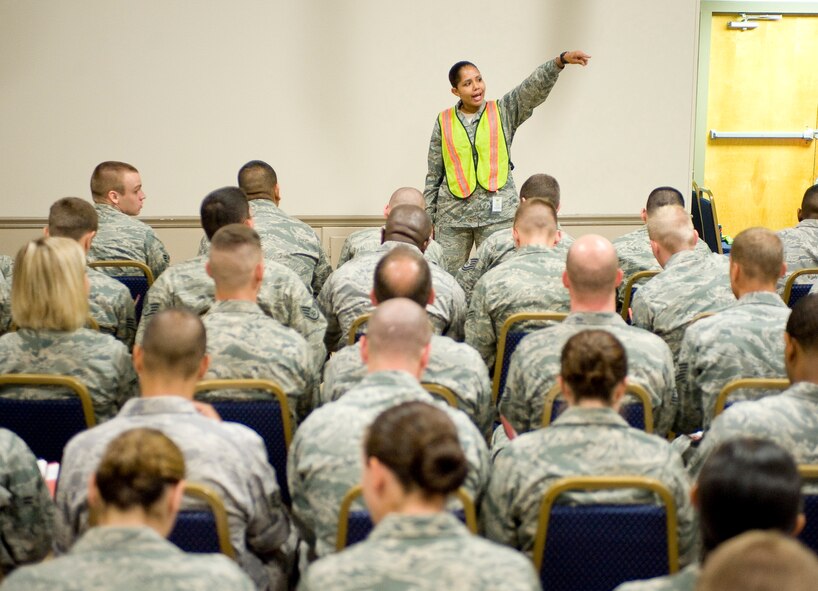 2nd Lt. Kathleen Chatara, 2nd Force Support Squadron, briefs a group of simulated deployers during a mobility exercise on Barksdale Air Force Base, La., July 28. The exercise was the first one of its kind at Barksdale to process simulated deployers alongside real world deployers. (U.S. Air Force photo/Senior Airman Chad Warren) (RELEASED)