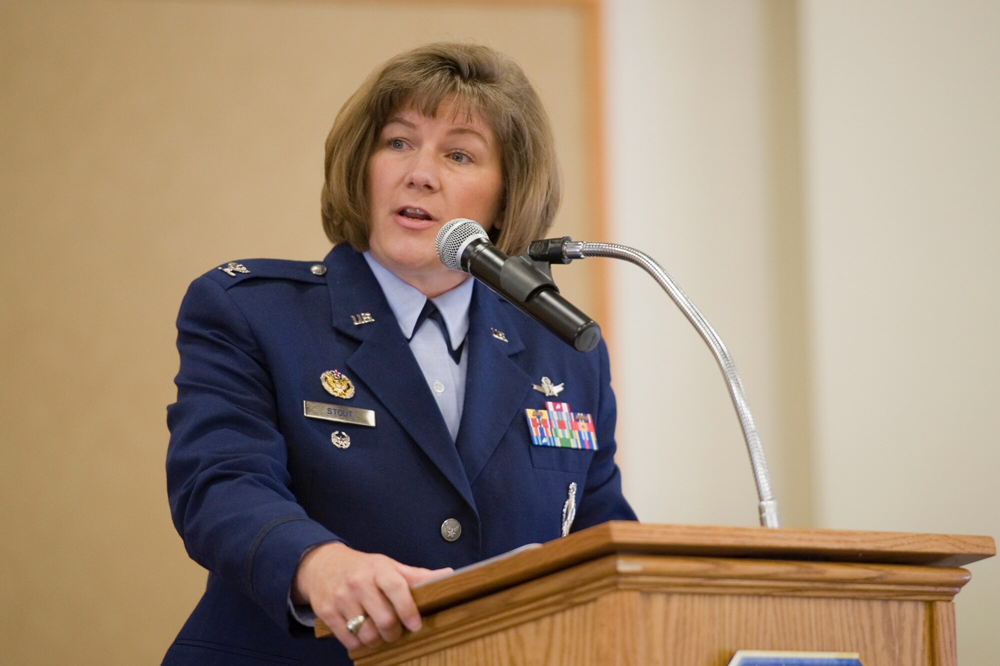 Col. Angela Stout speaks to an audience after assuming command of the 341st Mission Support Group at the Grizzly Bend, June 10. (U.S. Air Force photo/Beau Wade)
