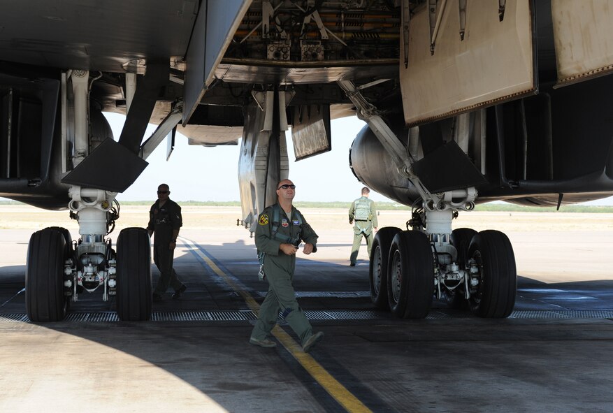 U.S. Air Force Maj. Scott DiGioia, 7th Operations Group, inspects the weapons bay of a B-1 Bomber during pre-flight inspection July 28, 2011, prior to the 7th Operations Support Squadron's Global Strike Challenge team take-off from Dyess AFB, Texas. The 7th OSS is one of five teams representing Dyess AFB as Dyess tries to bring home the championship a second year in a row.  (U.S. Air Force photo by Tech. Sgt. Darcie L. Ibidapo/Released))