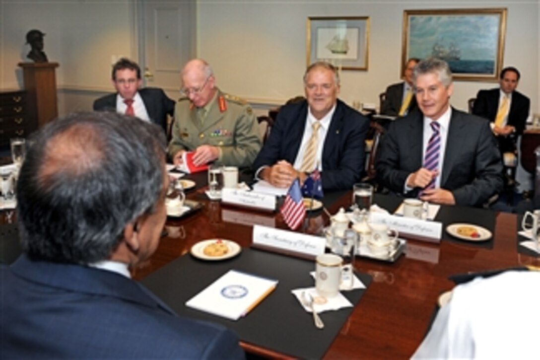 An Australian defense delegation led by Minister of Defense Stephen Smith (right) meets with Secretary of Defense Leon E. Panetta (left) in the Pentagon on July 27, 2011.  Delegation participants include:  Senior Ministerial Advisor Ben Burdon (2nd from left), Chief of the Defense Force Gen. David Hurley and Ambassador to the United States Kim Beazley.  