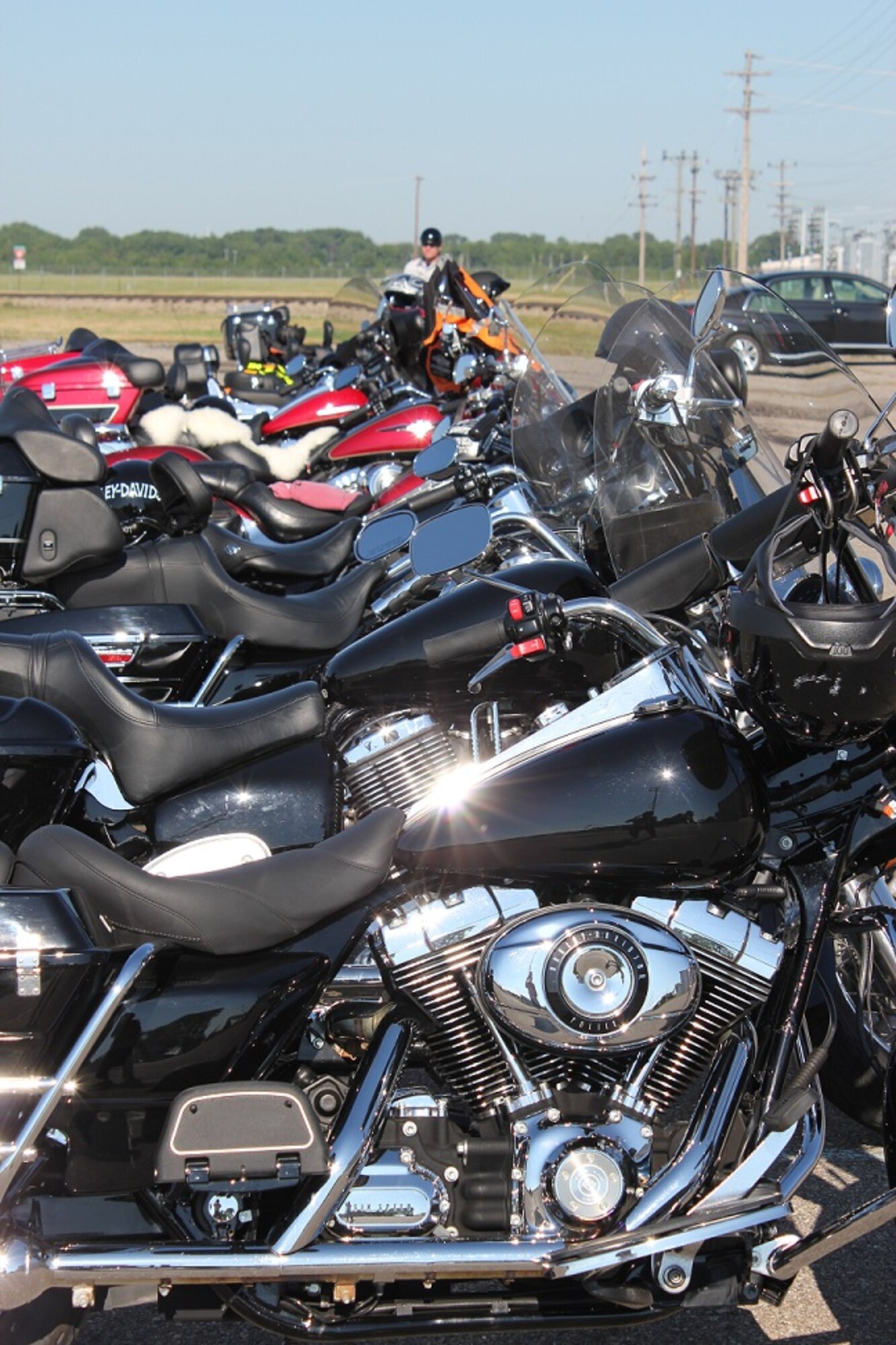Bikes lined up for a Motorcycle Mentorship Poker Run hosted by the 127th Wing Safety Office and the Detroit Arsenal Safety Office, at Selfridge Air National Guard Base, Mich., on July 30. The motorcycle rally had a focus on rider mentorship and safety. Twenty-six bikes and about 40 riders/passengers participated. (USAF photo by Capt. Penny Carroll)