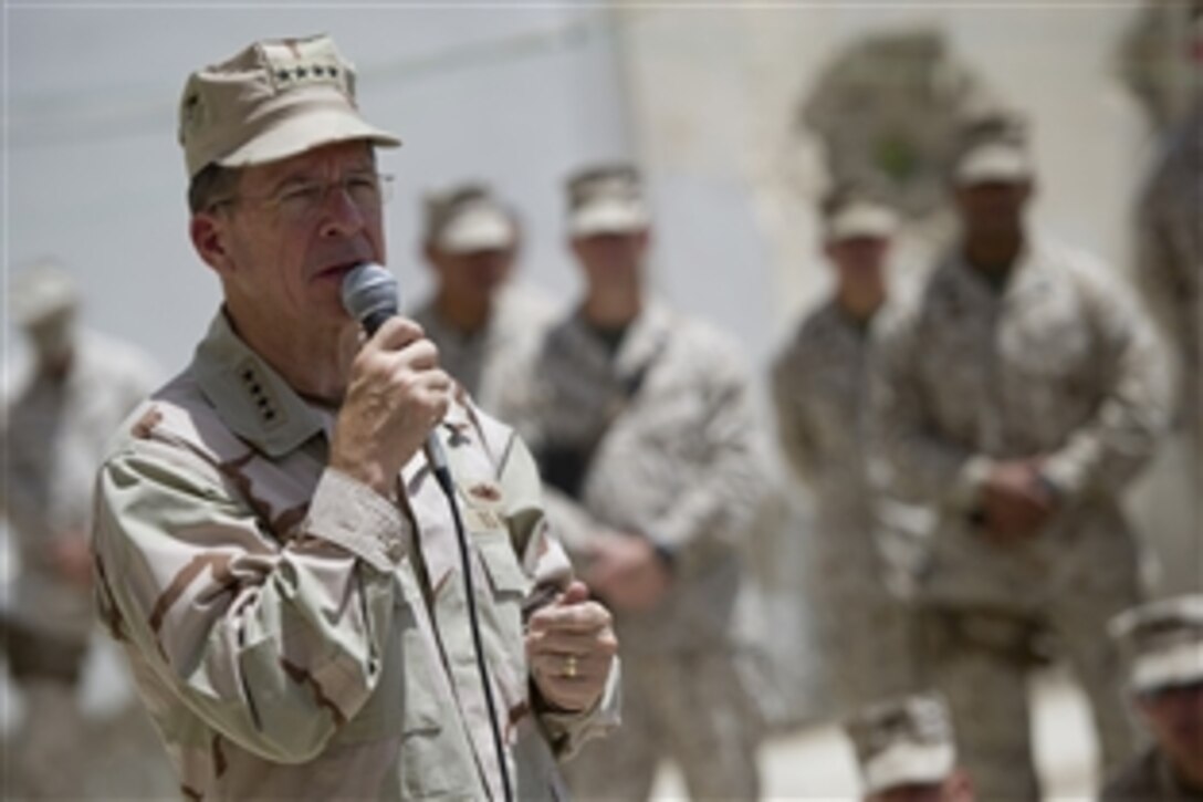 Chairman of the Joint Chiefs of Staff Navy Adm. Mike Mullen addresses Marines assigned to Forward Operating Base Jackson in Afghanistan, July 30, 2011. Mullen is on a five-day USO tour with comedian Jon Stewart, NBA Legend Karl Malone and magician David Blane visiting troops in Afghanistan and Iraq. 