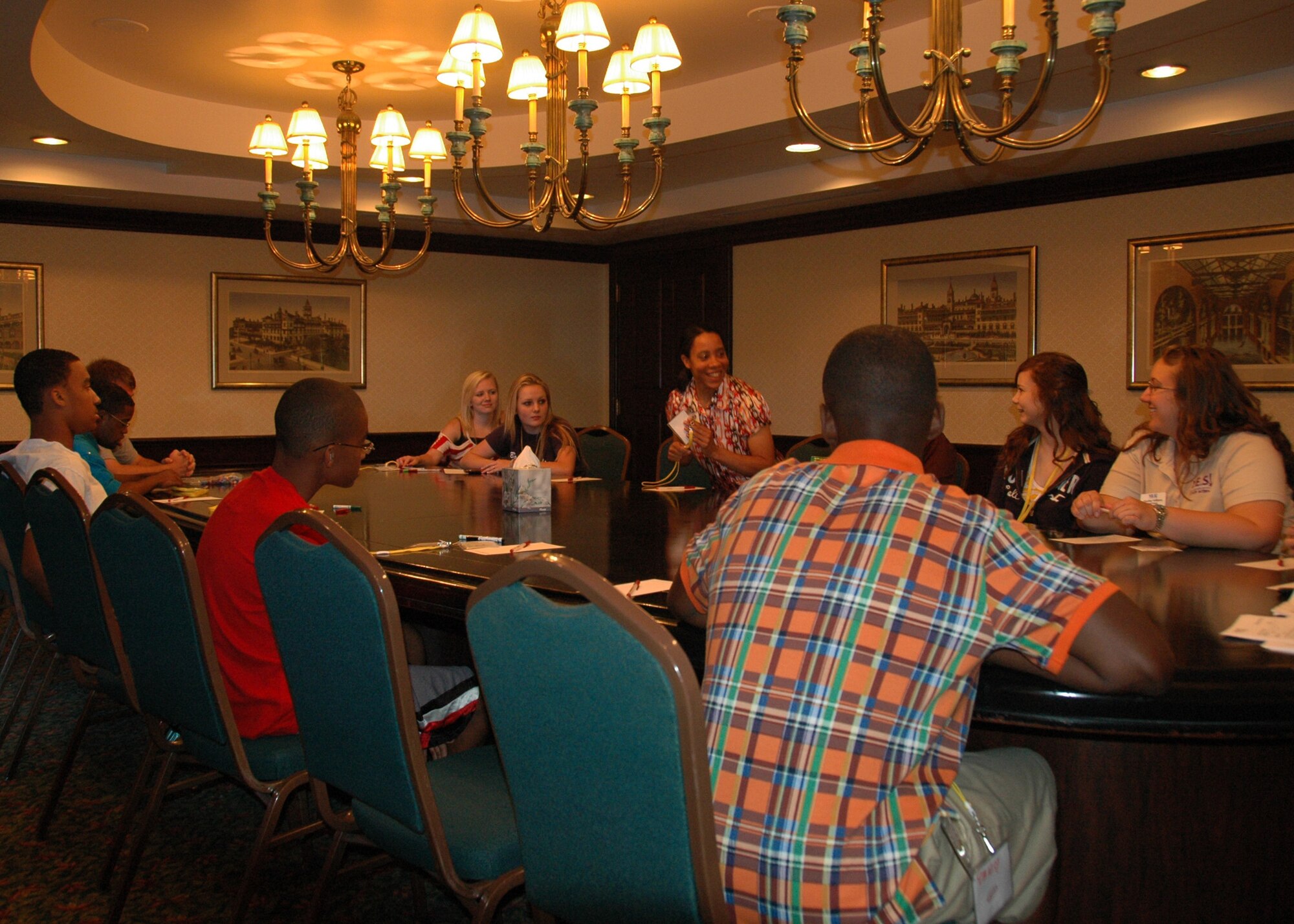 Military family members introduce themselves July 23 during a breakout session at the Yellow Ribbon Program’s Southeast Region event held at a hotel in Ponte Vedra, Fla. July 23-24.  The YRP is a Department of Defense initiative offering a wide range of specialized support and information to military members and families of the Air Force Reserve and National Guard to help them cope with the unique stresses of military deployments.  The recent YRP event brought together attendees from Duke Field and several other Southeast region military installations. (U.S. Air Force photo/Maj. Terry Lisenbee)