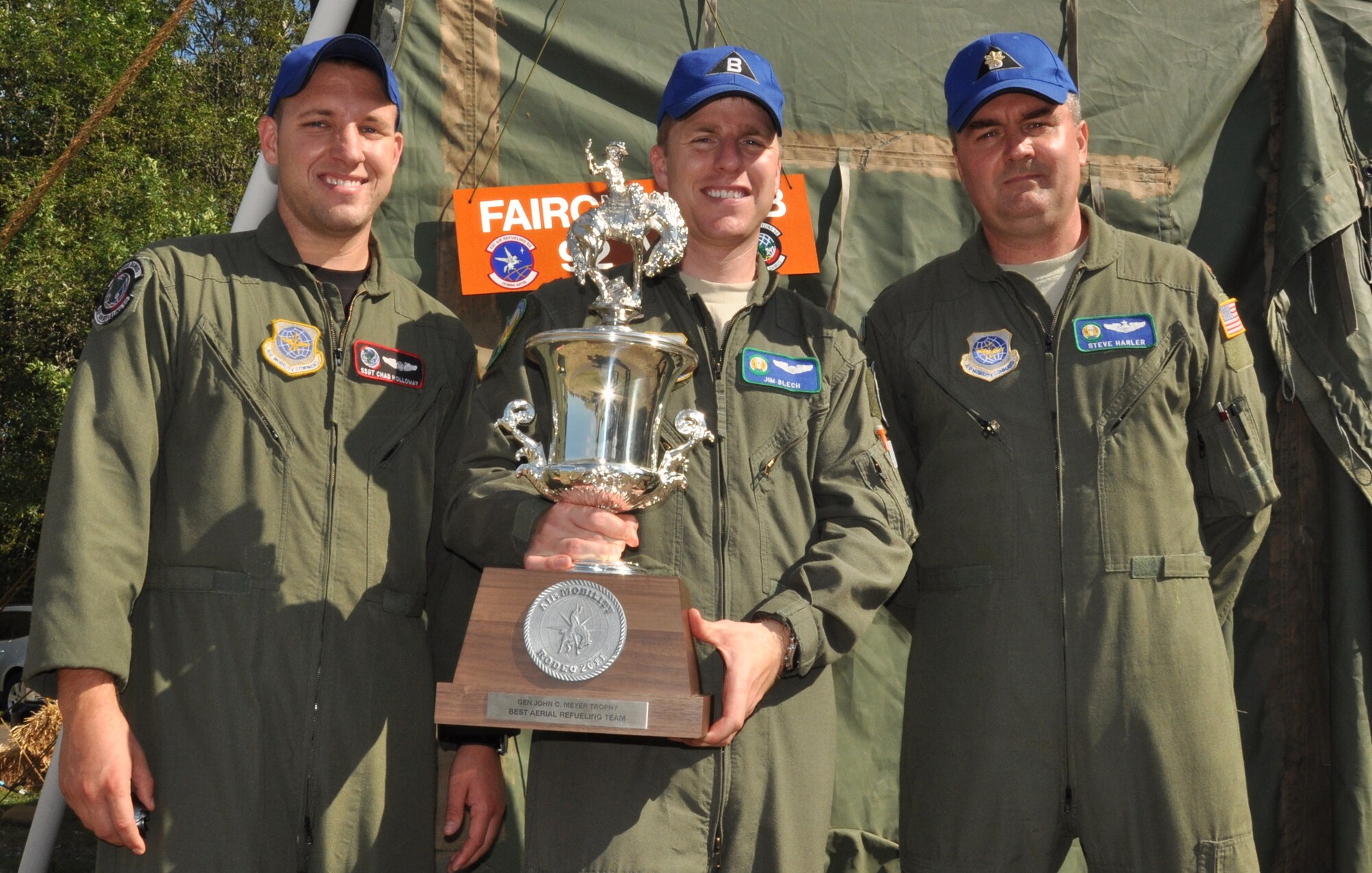 Fairchild Air Force Base’s Rodeo team earned the 2011 Air Mobility Rodeo Best Refueling Team along with the 67th Air Mobility Wing, Altus AFB, Okla. The aircrew of the mission was, from left, Staff Sgt. Chad Holloway, Capt. Jim Blech and Maj. Steve Harler pictured in front of the Fairchild tent at McChord Field's heritage park, Joint Base Lewis-McChord, Wash.,  July 29. (U.S. Air Force Photo/Tech. Sgt. Jennifer Buzanowski)