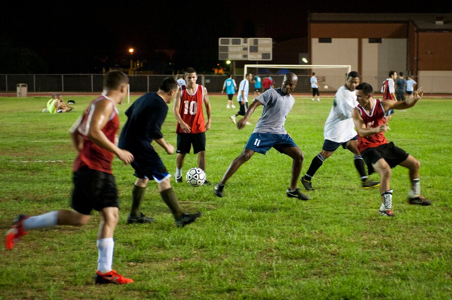Two U.S. Air Force teams face off in the Late Night Soccer tournament at the high school soccer field July 29, 2011, at Incirlik Air Base, Turkey. Eleven U.S. and Turkish Air Force teams competed in the double-elimination tournament. (U.S. Air Force photo by Airman 1st Class Clayton Lenhardt/Released)