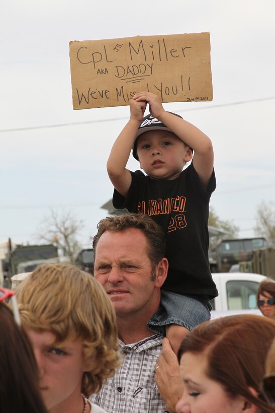 Three-year-old Seth Miller anxiously awaits his dad’s return to the Combat Center June 1, 2011. Cpl. Jared Miller, a rifleman with 3rd Light Armored Reconnaissance Battalion, has been on a seven month long deployment to Afghanistan.