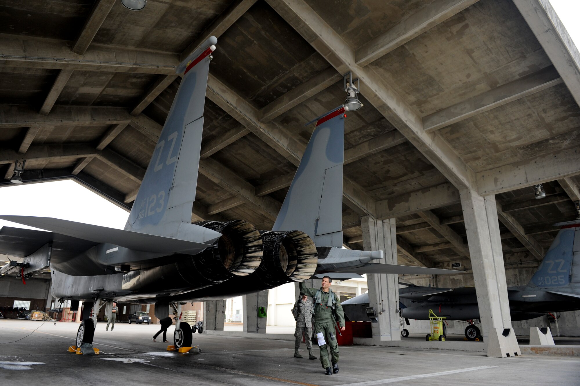 Brig Gen Kenneth Wilsbach, 18th Wing commander, inspects his F-15 Eagle prior to his final flight as the wing commander June 1. Following a change of command ceremony June 3, General Wilsbach will leave Kadena to become the United States Pacific Command deputy director for operations. (U.S. Air Force photo/Staff Sgt. Jonathan Steffen)
