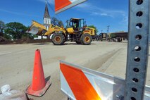 MINOT, N.D. -- Members of Team Minot work together to make sandbags at the Minot Public Works June 1 In preparation for possible flooding, the city of Minot, with assistance from Airmen from Minot Air Force Base, North Dakota National Guard as well as many other organizations, are setting up secondary dikes along the river. The Souris River threatens to break the levies already in place, thousands of Minot citizens, including military members, their families and DoD civilians, have been forced to evacuate the area.  (U.S. Air Force photo/Senior Airman Jesse Lopez)