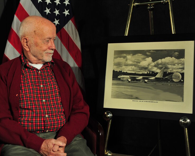 MINOT AIR FORCE BASE, N.D. -- Retired Air Force Master Sgt. and jet engine specialist, Morris A. Walsh, visited Minot Air Force Base May 26, to present base leadership here with an antique photo of a YB-52 Stratofortress aircraft, which he worked on during his time in service during the early 1950s. During his 20-year career in the Air Force, he worked as a jet engine mechanic instructor for air training command, as well as the research and development command on the advancement of new military aircraft. (U.S. Air Force photo/Senior Airman Jesse Lopez)
