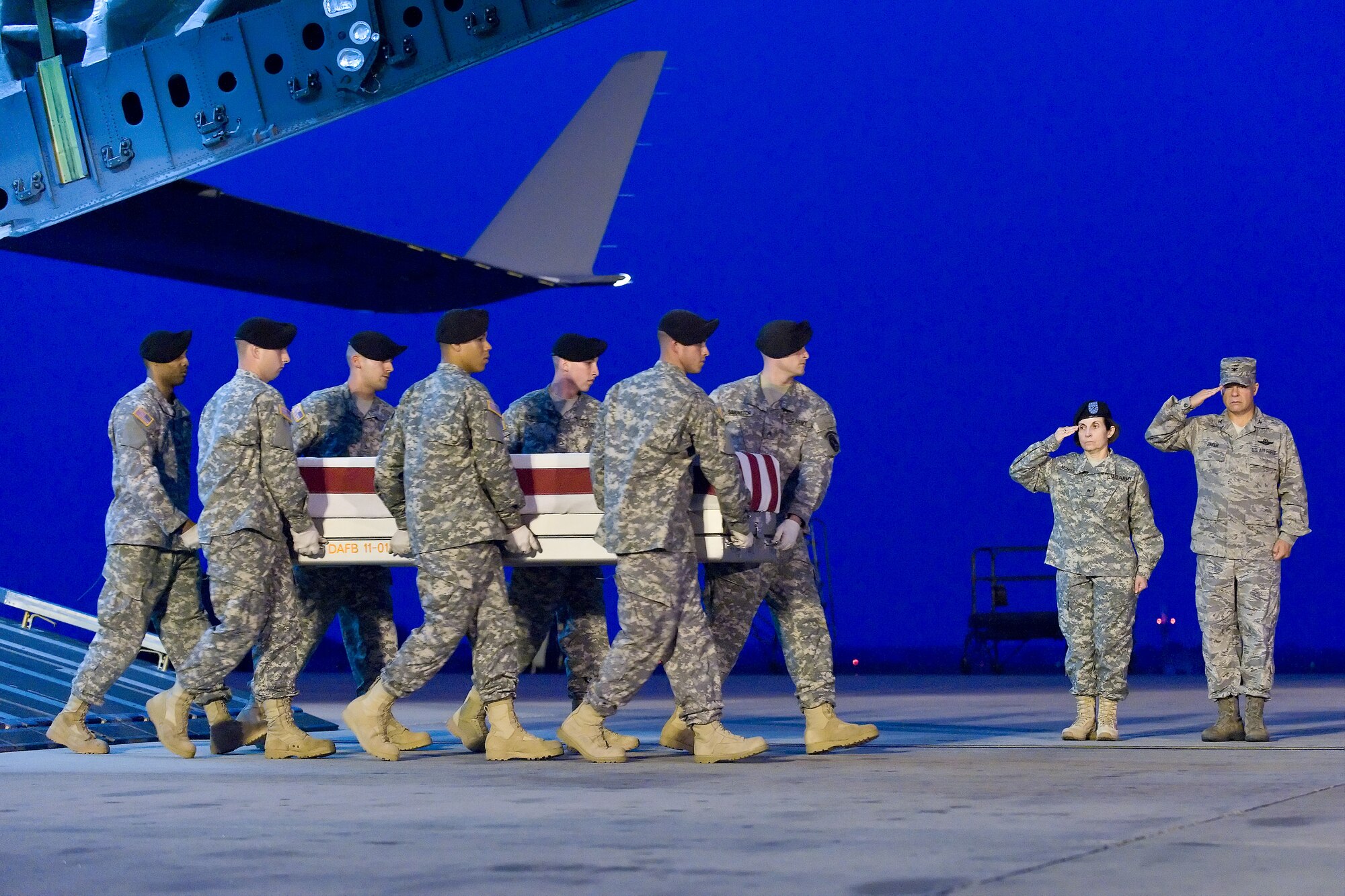 A U.S. Army carry team transfers the remains of Army Sgt. Aaron J. Blasjo, of Riverside, Calif., at Dover Air Force Base, Del., May 31, 2011. Blasjo was assigned to the 3rd Special Forces Group, Fort Bragg, N.C. (U.S. Air Force photo/Roland Balik)