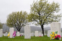 Multiple graves at the Black Hills National Cemetery, S.D. are decorated with flowers, May 29, 2011 to honor those who have served in the military.  Approximately 24,500 people visited the cemetery throughout Memorial Day weekend. (U.S. Air Force photo/Staff Sgt. Marc I. Lane)