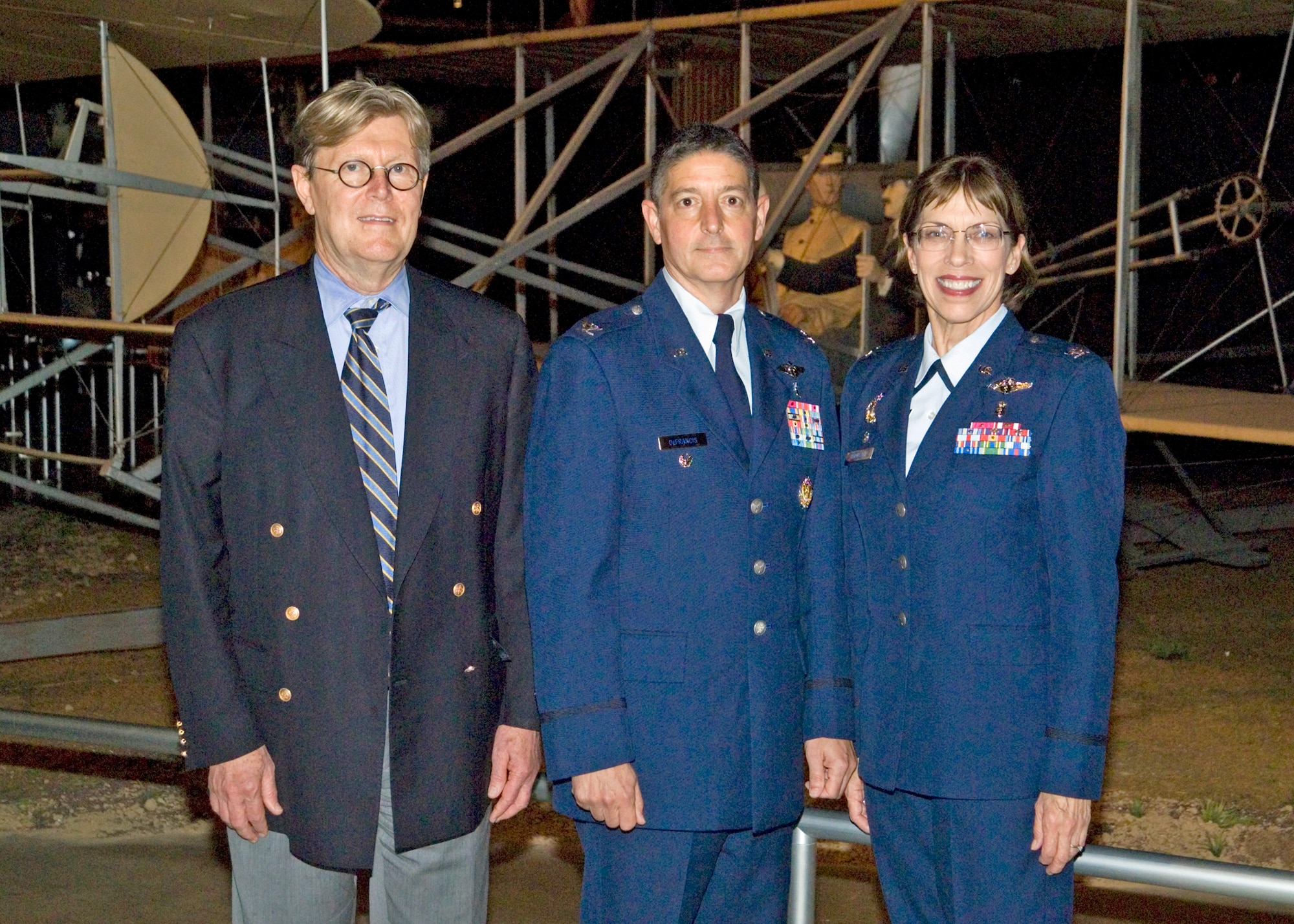 Dr. Albert Painter, Col. Dominic DeFrancis and Col. Kimberly Slawinski pause for a photo prior to the graduation ceremony for Wright-Patterson Medical Center medical and dental education residents held May 26, 2011 at the National Museum of the U.S. Air Force.  The officers will now be assigned to Air Force bases around the world to provide medical care for Airmen, joint warfighters, military retirees and eligible family members. Dr. Painter is assistant dean for faculty affairs, Wright State University Boonshoft School of Medicine, Colonel DeFrancis is Medical Corps director, Office of the Air Force Surgeon General, and Colonel Slawinski is commander, 88th Medical Group at Wright-Patterson Air Force Base, Ohio. (U.S. Air Force photo/Mark Pugel) 