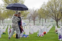 Airmen from Ellsworth Air Force Base, S.D. help visitors locate grave markers at the Black Hills National Cemetery, S.D. during Memorial Day weekend, May 29, 2011.  Memorial Day was first observed on 30 May 1868, when flowers were placed on the graves of Union and Confederate soldiers at Arlington National Cemetery. (U.S. Air Force photo/Staff Sgt. Marc I. Lane)
