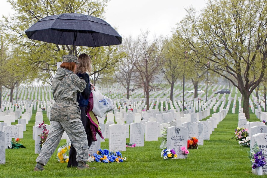 Airmen from Ellsworth Air Force Base, S.D. help visitors locate grave markers at the Black Hills National Cemetery, S.D. during Memorial Day weekend, May 29, 2011.  Memorial Day was first observed on 30 May 1868, when flowers were placed on the graves of Union and Confederate soldiers at Arlington National Cemetery. (U.S. Air Force photo/Staff Sgt. Marc I. Lane)