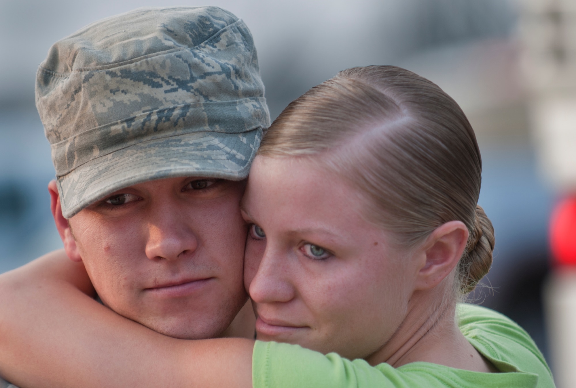 Staff Sgt. Chris Bonhorst, 823rd Base Defense Squadron member, hugs his wife, Senior Airman Brittany Bonhorst, 23rd Logistics Readiness Squadron member, before departing for a deployment at Moody Air Force Base, Ga. Members of the 823rd BDS will be deployed to Afghanistan for at least six months. (U.S. Air Force photo/Airman 1st Class Douglas Ellis)(RELEASED)
