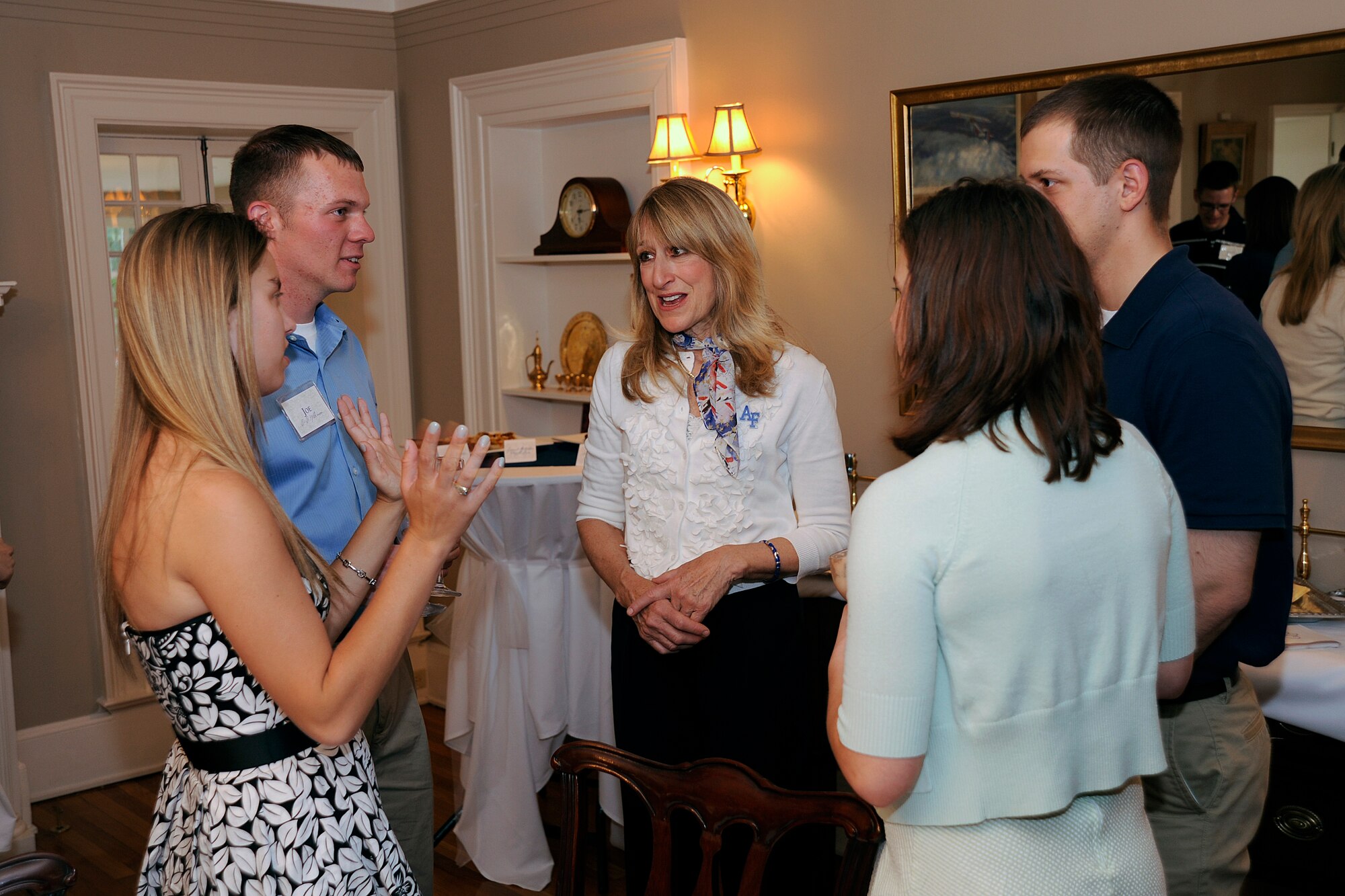 Cadets speak with Paula Gould, wife of Air Force Academy Superintendent Lt. Gen. Mike Gould at the Fiancees Reception. This event, hosted by the commandant of cadets was part of graduation week activities for the class of 2011. (U.S. Air Force Photo/Ray McCoy)