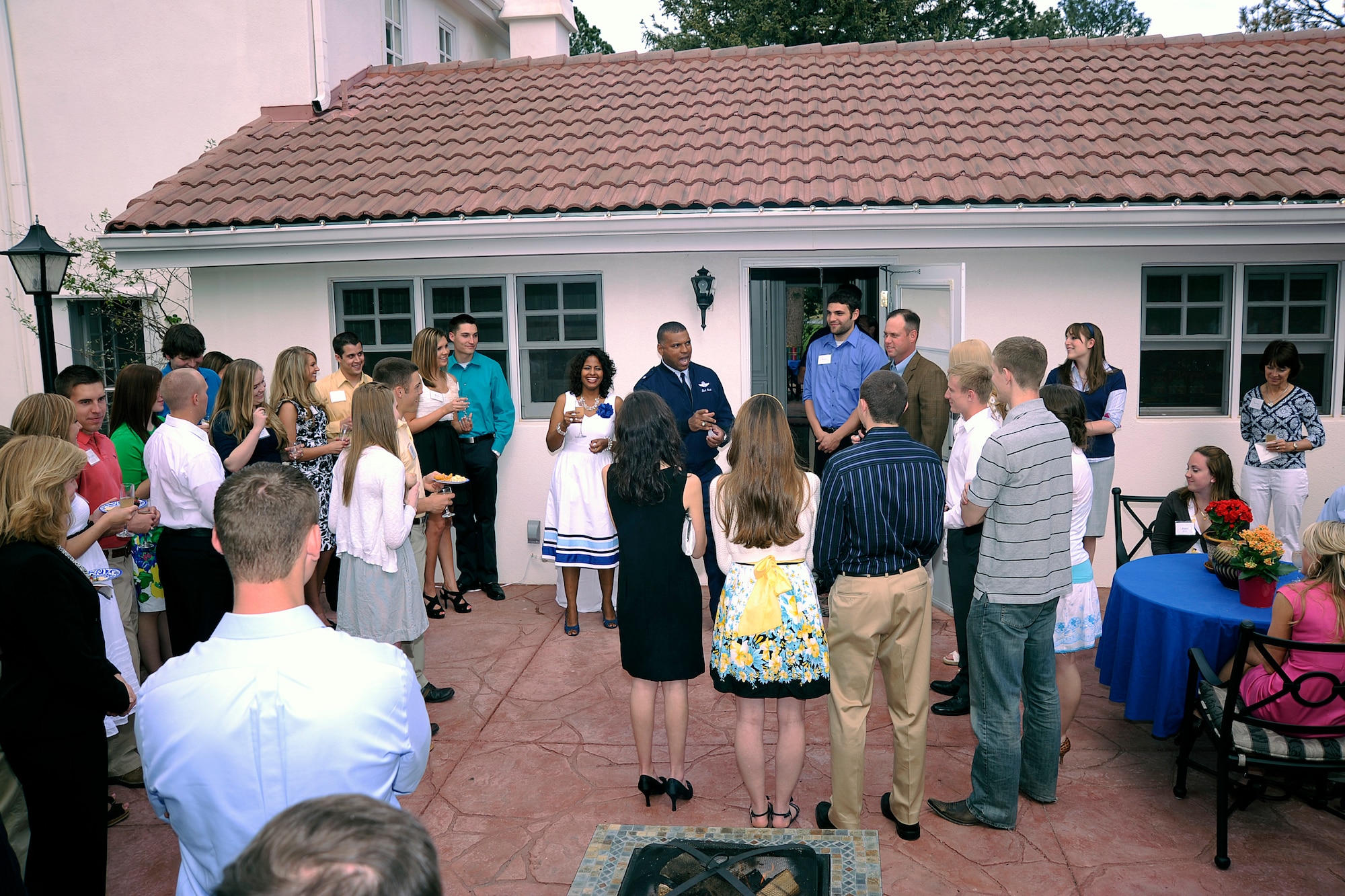 Commandant of Cadets Brig. Gen. Richard Clark and his wife Amy welcome cadets and guests to their home for the Fiancees Reception.  This event, hosted by the commandant, was part of graduation events for the Class of 2011. (U.S. Air Force Photo/Ray McCoy)