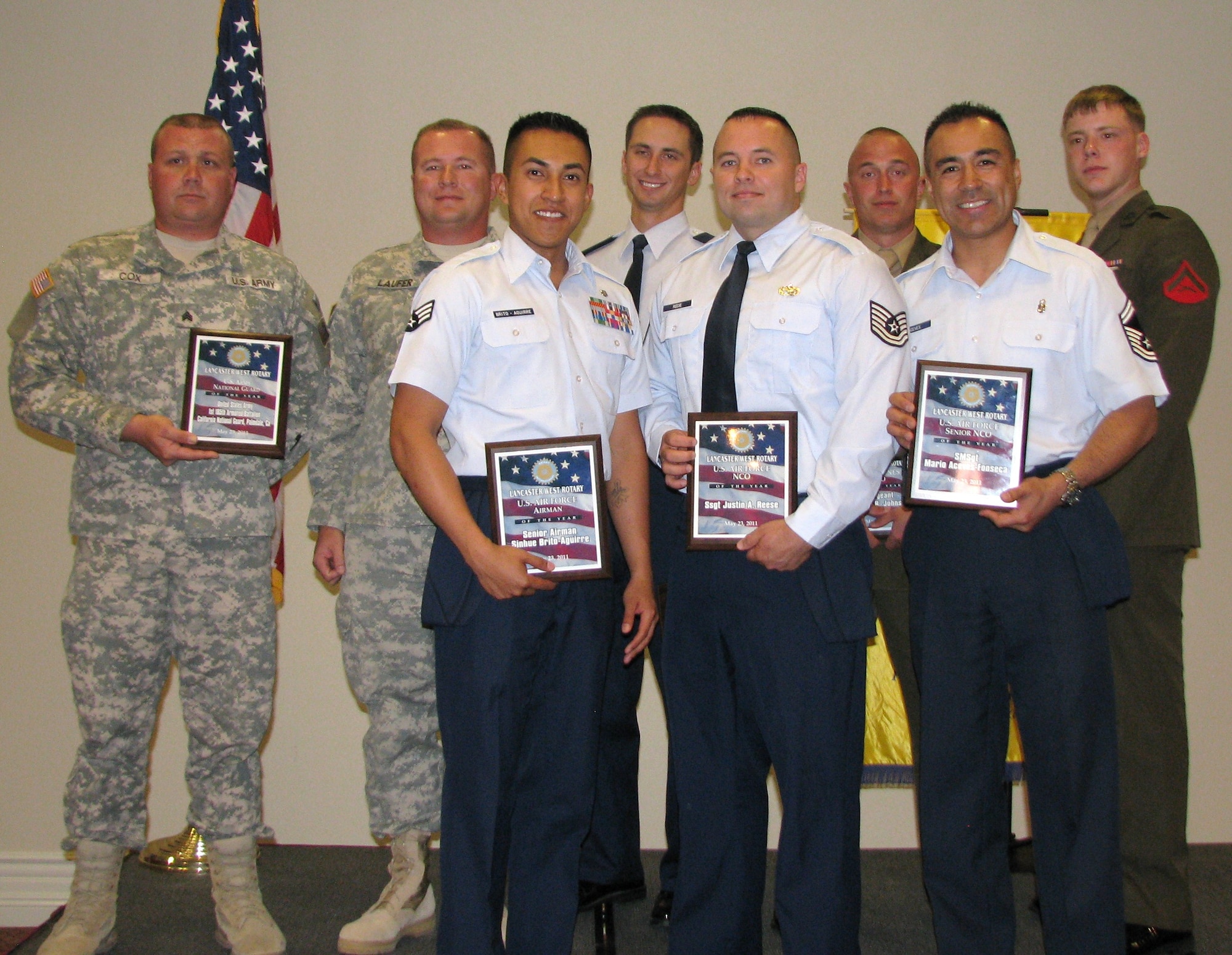Award Winners: The Lancaster West Rotary Club celebrated National Military Appreciation Month by honoring 10 servicemembers who were recognized earlier by their command for service above and beyond the call of duty. Pictured from left (front row): Senior Airman Sinuhe Brito-Aguirre, 95th Aerospace Medicine Squadron; Tech. Sgt. Justin Reese, 412th Aircraft Maintenance Squadron; Senior Master Sgt. Mario Aceves-Fonseca, 95th Medical Operations Squadron. Second row (from left): Army National Guardsman Sgt. John Cox, Palmdale National Guard Armory, Army Staff Sgt. Eric Laufer, Palmdale National Guard Armory; Air Force 1st Lt. Joseph J. Sysko, 95th Comptroller Squadron; Gunnery Sgt. Tim LaCoe, Marine Medium Helicopter Squadron 764, and Lance Cpl. Kalab Lund, HMM 764. Also honored, but not pictured was Air Force Master Sgt. Phillip M. Gettins, 412th Operations Group, who was unable to attend. (Air Force photo by Diane Betzler)