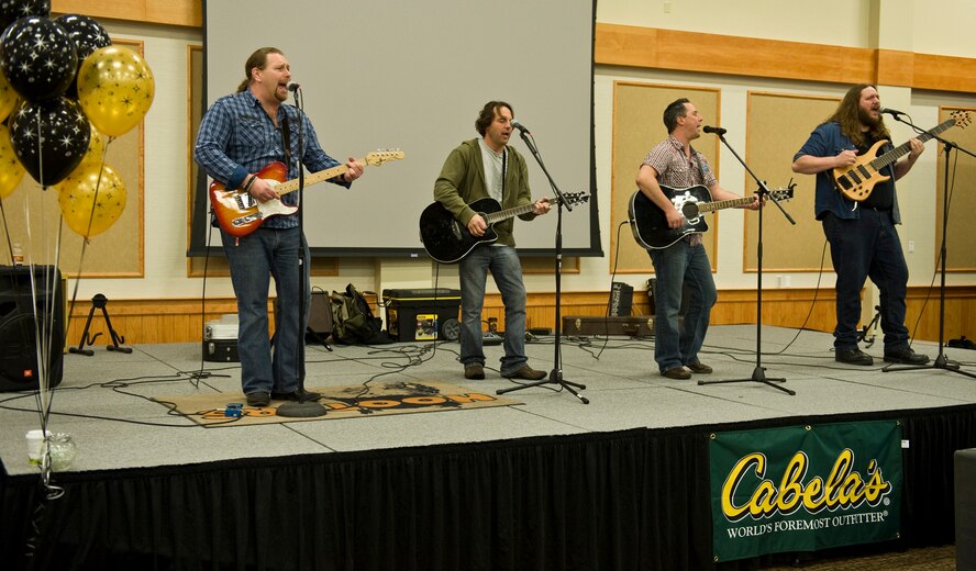 The Electric City Mafia band provided the entertainment for the crowd gathered at the new facility for the first time playing live country and southern rock music. (U.S. Air Force photo/John Turner)
