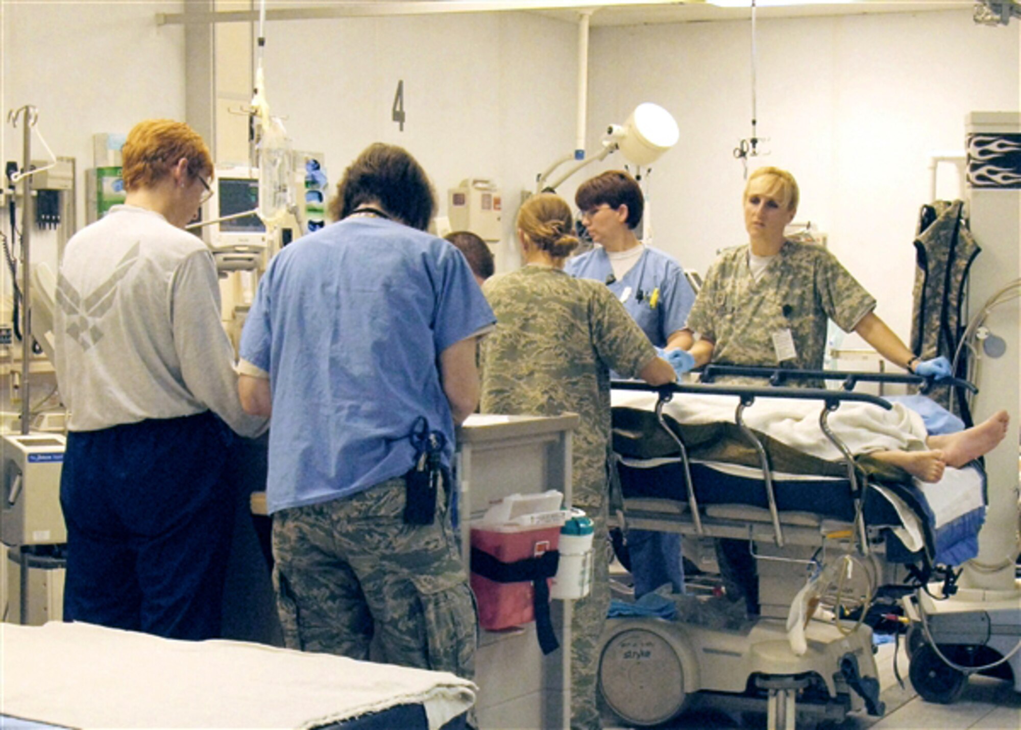 The operating rooms at Staff Sgt. Heathe N. Craig Joint Theater Hospital at Bagram Airfield, Afghanistan, keep busy with the steady stream of arriving patients. Most of the patients are U.S., coalition and Afghan security forces troops, but some are Afghan civilians and even enemy forces. (DOD photo/Donna Miles) 
