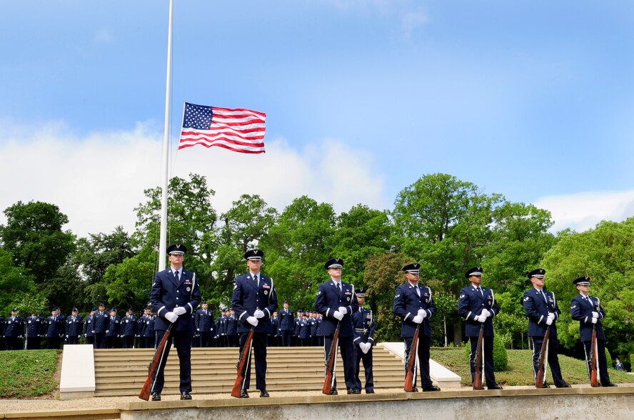 CAMBRIDGE, England -- The Team Mildenhall Honor Guard provides ceremonial services during the Madingley American Cemetery Memorial Service in Cambridge, England, May 30, 2011. The honor guard also performed a three-volley salute during the service in remembrance of fallen heroes. (U.S. Air Force photo/Senior Airman Ethan Morgan)