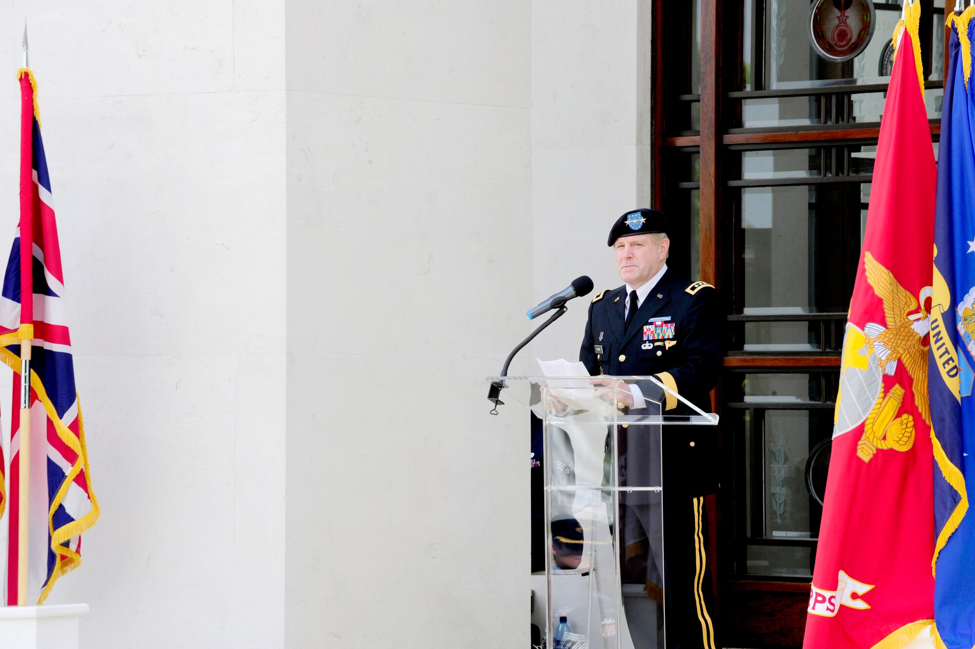 Cambridge, England -- Army Lt. Gen. John Gardner, U.S. European Command deputy commander, speaks to the attending British and American communities during the Madingley American Cemetery Memorial Service in Cambridge May 30, 2011.  General Gardner was one of three guest speakers, along with Hugh Duberly, Her Majesty's Lord-Lieutenant of Cambridgeshire, and Barbara Stephenson, Deputy Chief of Mission Embassy of the United States, London, England. (U.S. Air Force photo/Senior Airman Ethan Morgan)
